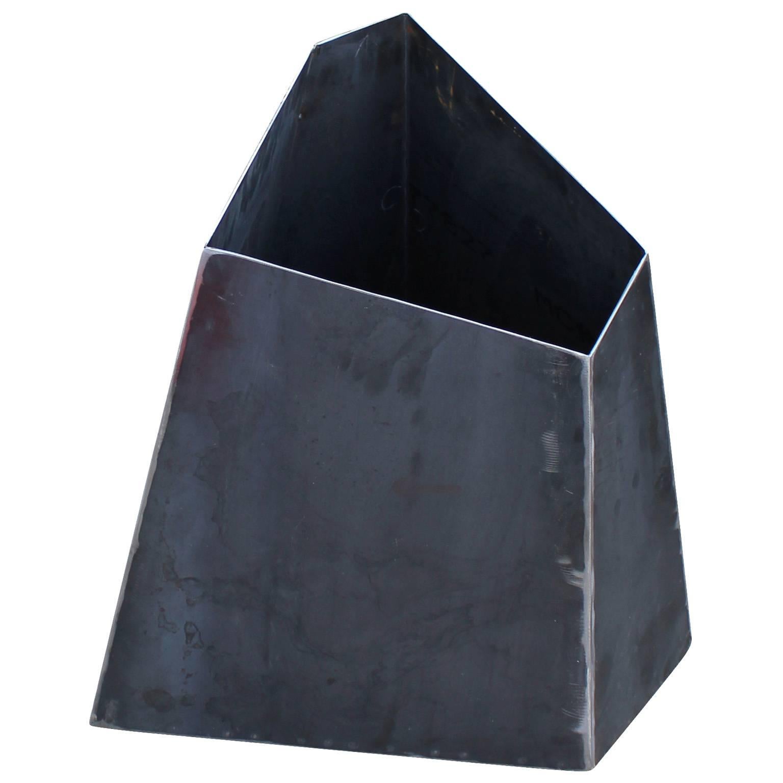 Custom-made Corten steel planter. This type of steel will get a perfect rust patina but will not rot. Geometric shape looks incredible from all angles. Inquire for custom sizes and powder coat finishes.