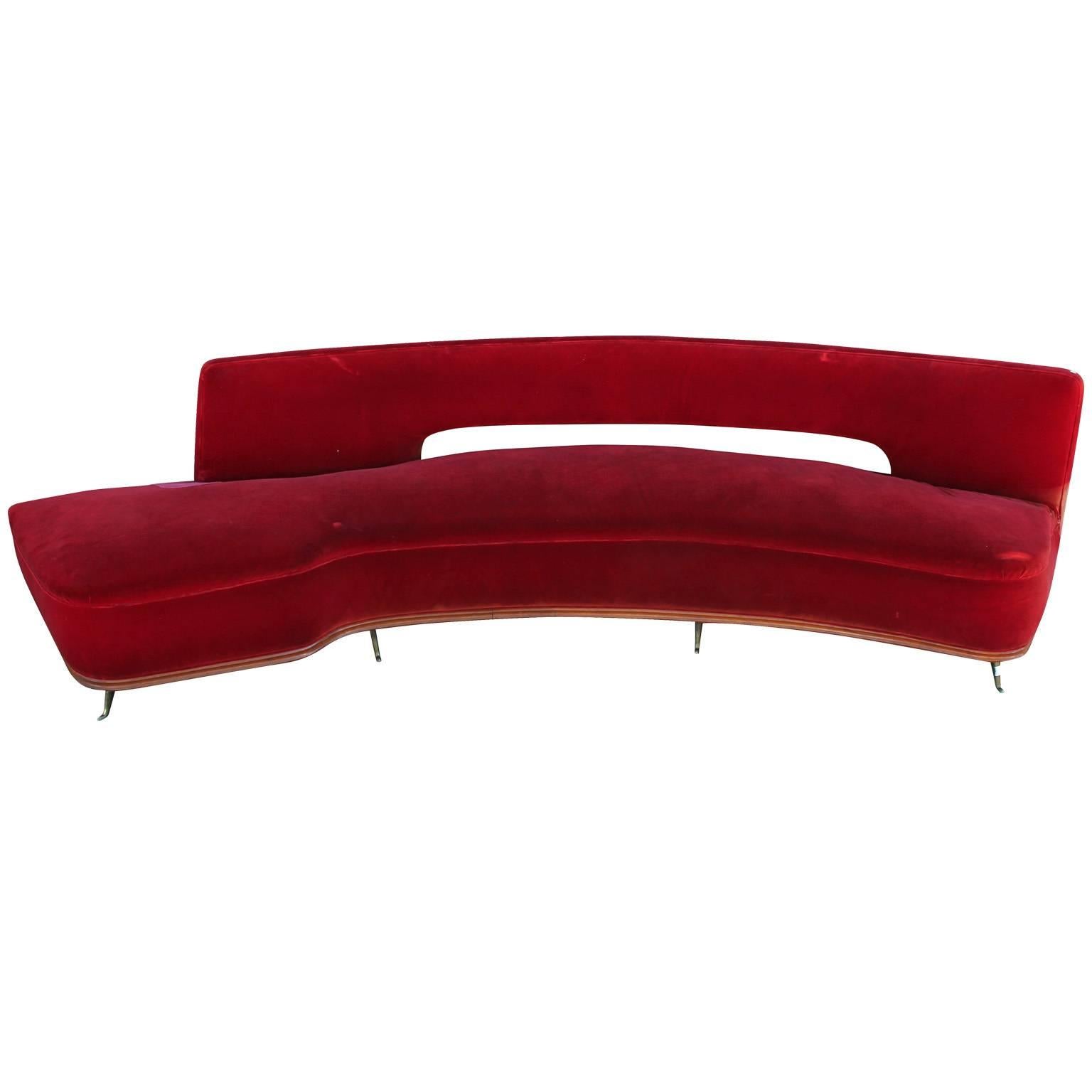 red curved sofa
