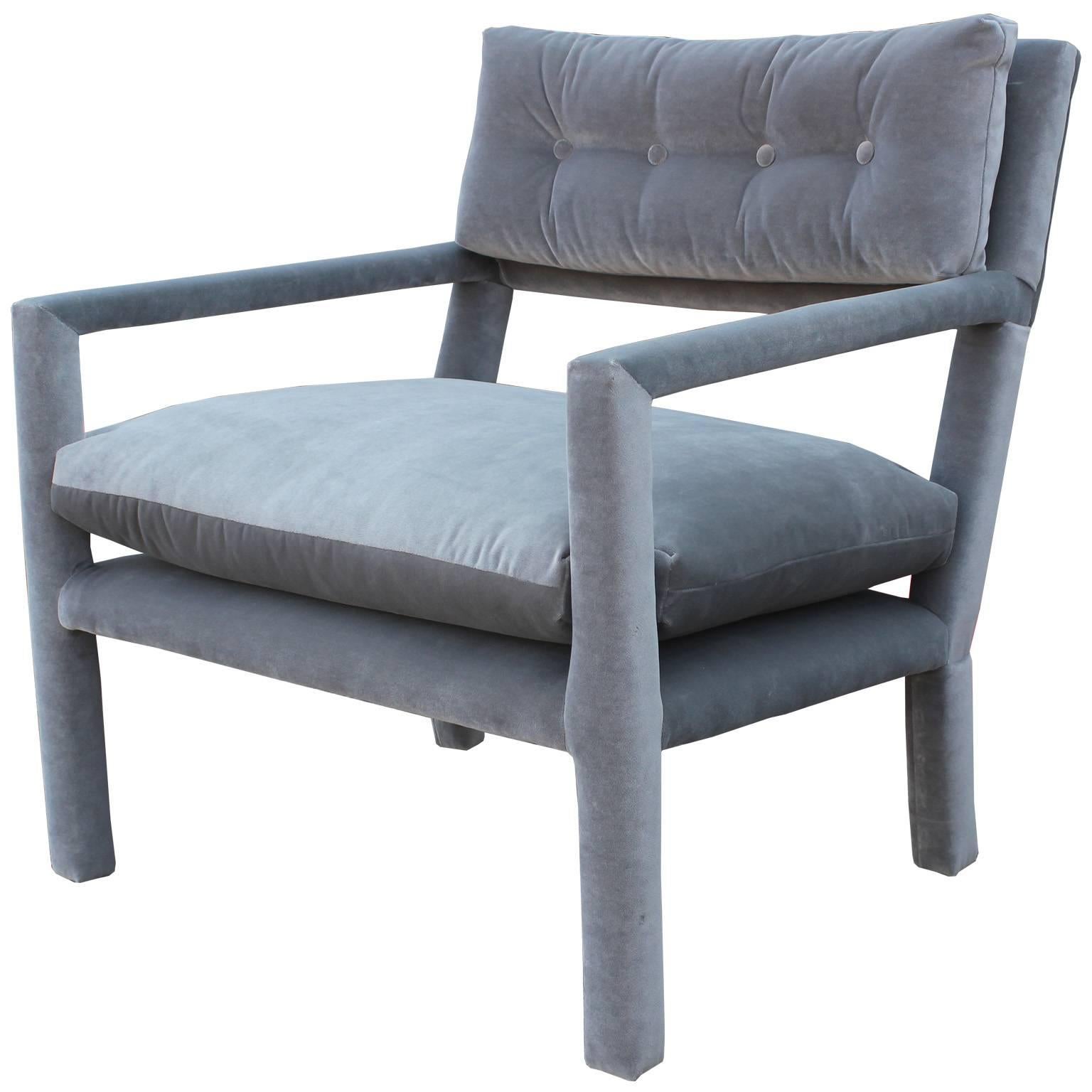 Luxe pair of Milo Baughman style Parsons lounge chairs. Chairs are freshly upholstered in a soft dove grey velvet. Chairs have excellent lines and negative space.