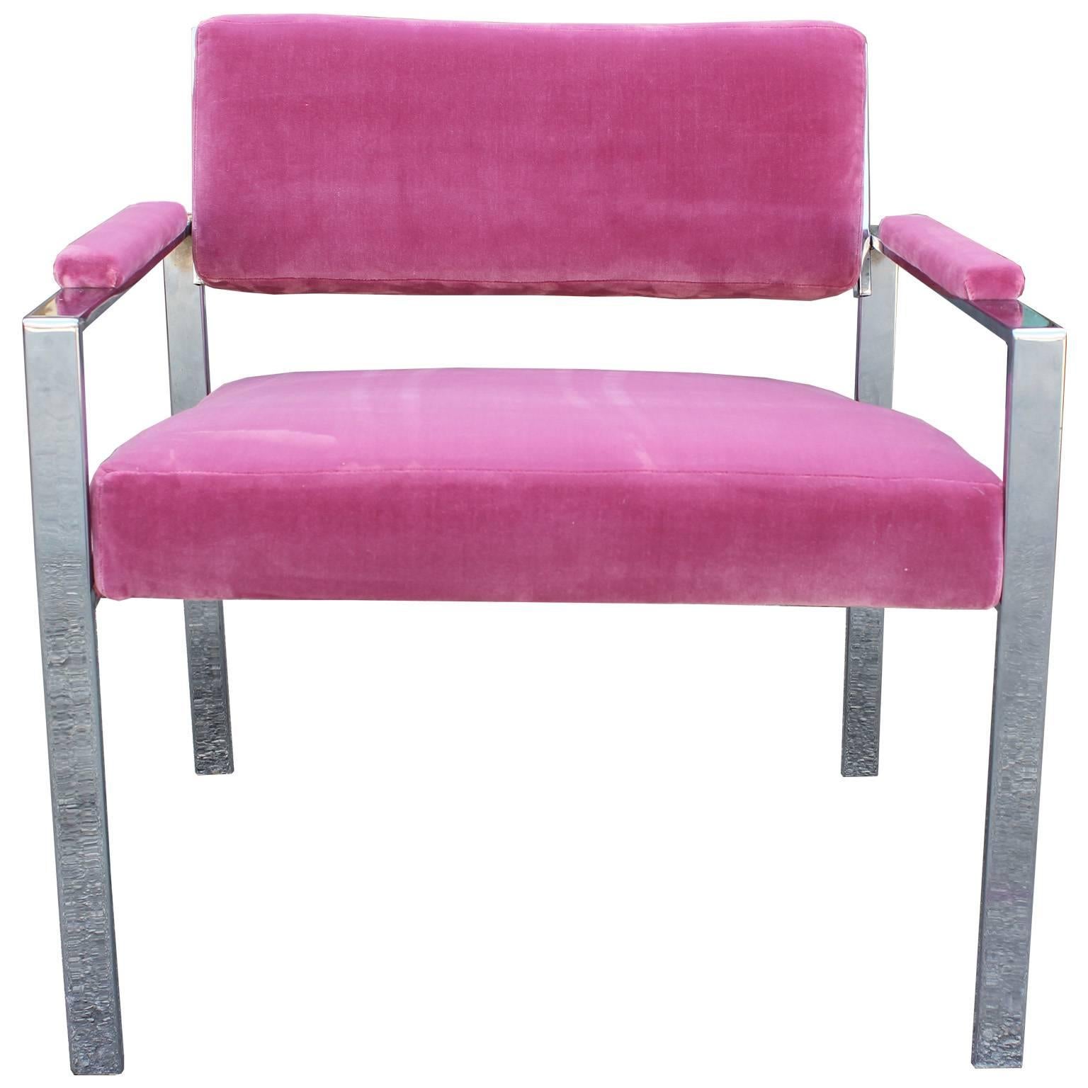 Excellent pair of chrome frame lounge chairs by Milo Baughman. Chairs are freshly upholstered in a glam pink velvet. Chrome frames have excellent clean lines with an ergonomic tilt at the seat.