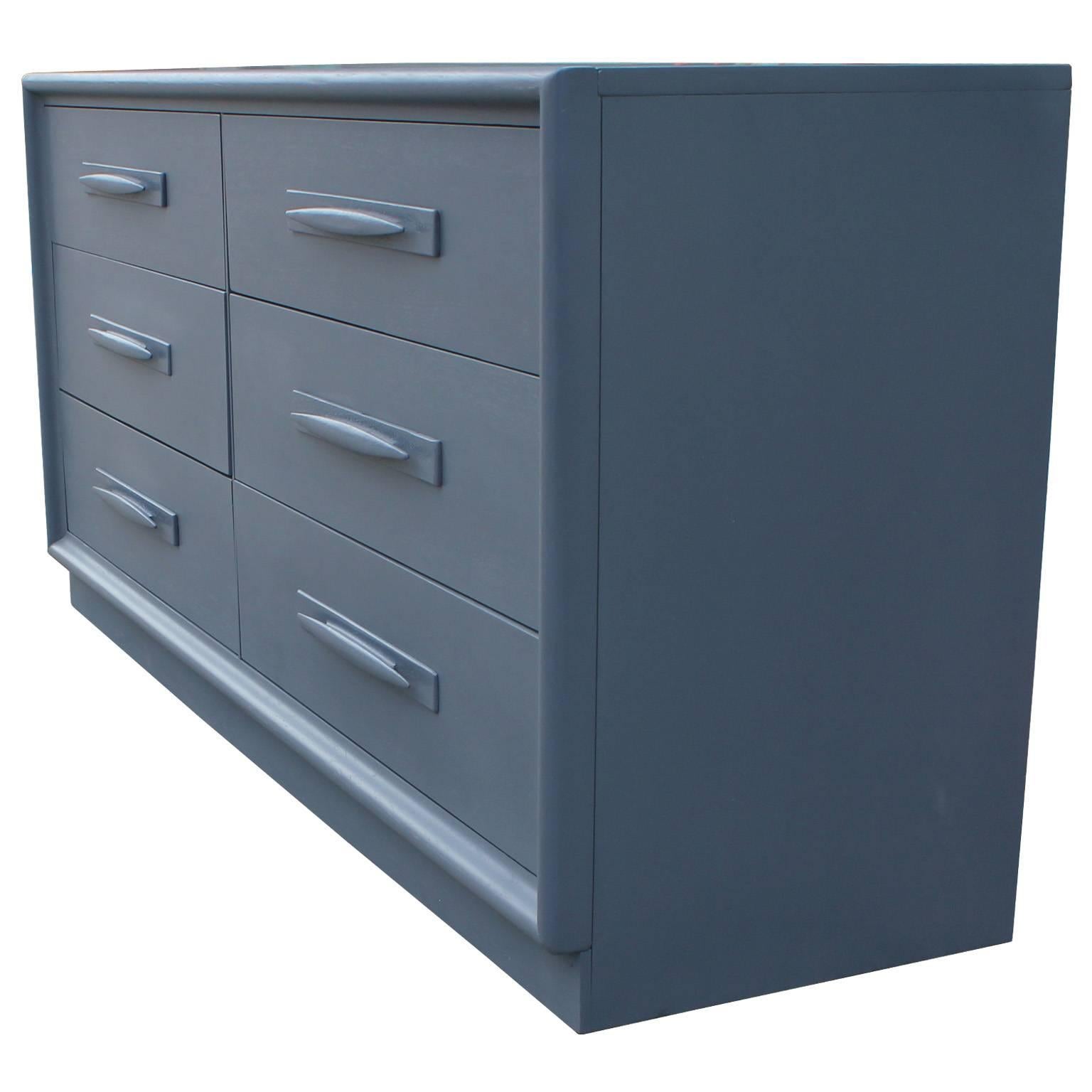 Excellent six-drawer dresser by Broyhill. Dresser features clean lines with sculptural wood pulls. Freshly finished in a French blue grey stain.