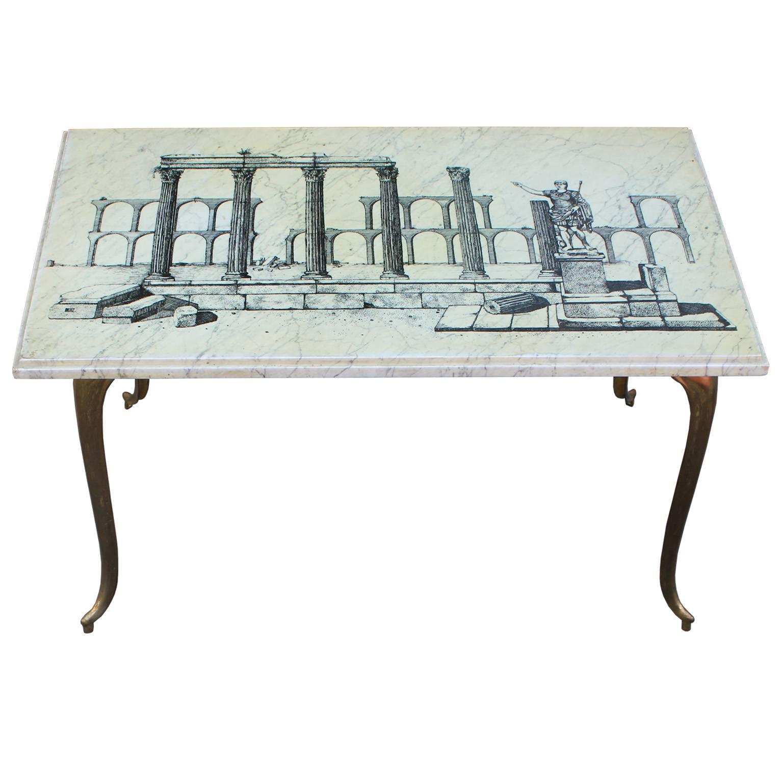Fabulous and unusual pair of Italian side tables. Marble tops depict an ancient Roman motif featuring columns and aqueducts. Delicate brass legs finish the tables. Perfect in a transitional or Hollywood Regency style interior.