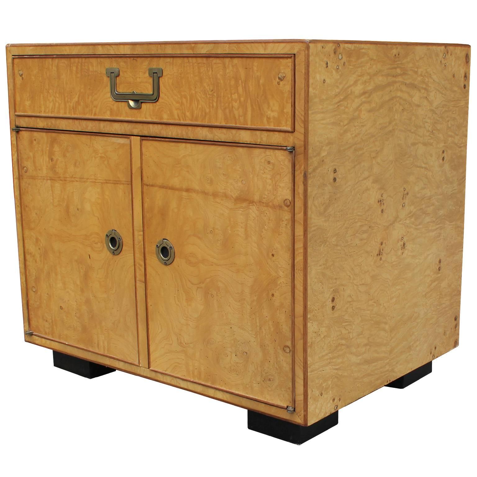 Glamorous pair of nightstands by Widdicomb. Blonde burl wood has excellent graining. Brass Campaign style hardware finishes the pieces. Perfect in a Mid-Century or Hollywood Regency style interior.