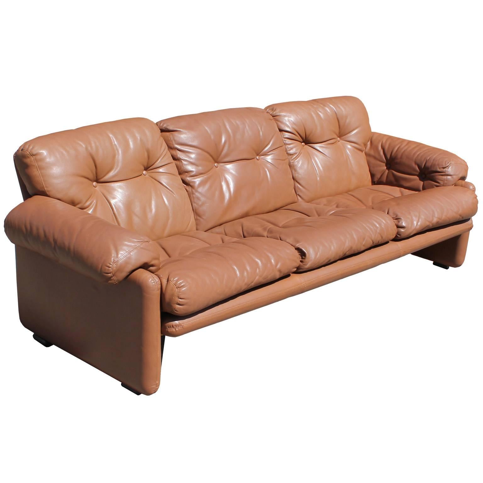 Wonderful leather sofa by B&B Italia. Caramel colored leather is in great vintage condition. Sofa would look perfect in a safari style, modern, or Mid-Century space. Pair of matching loveseats available.