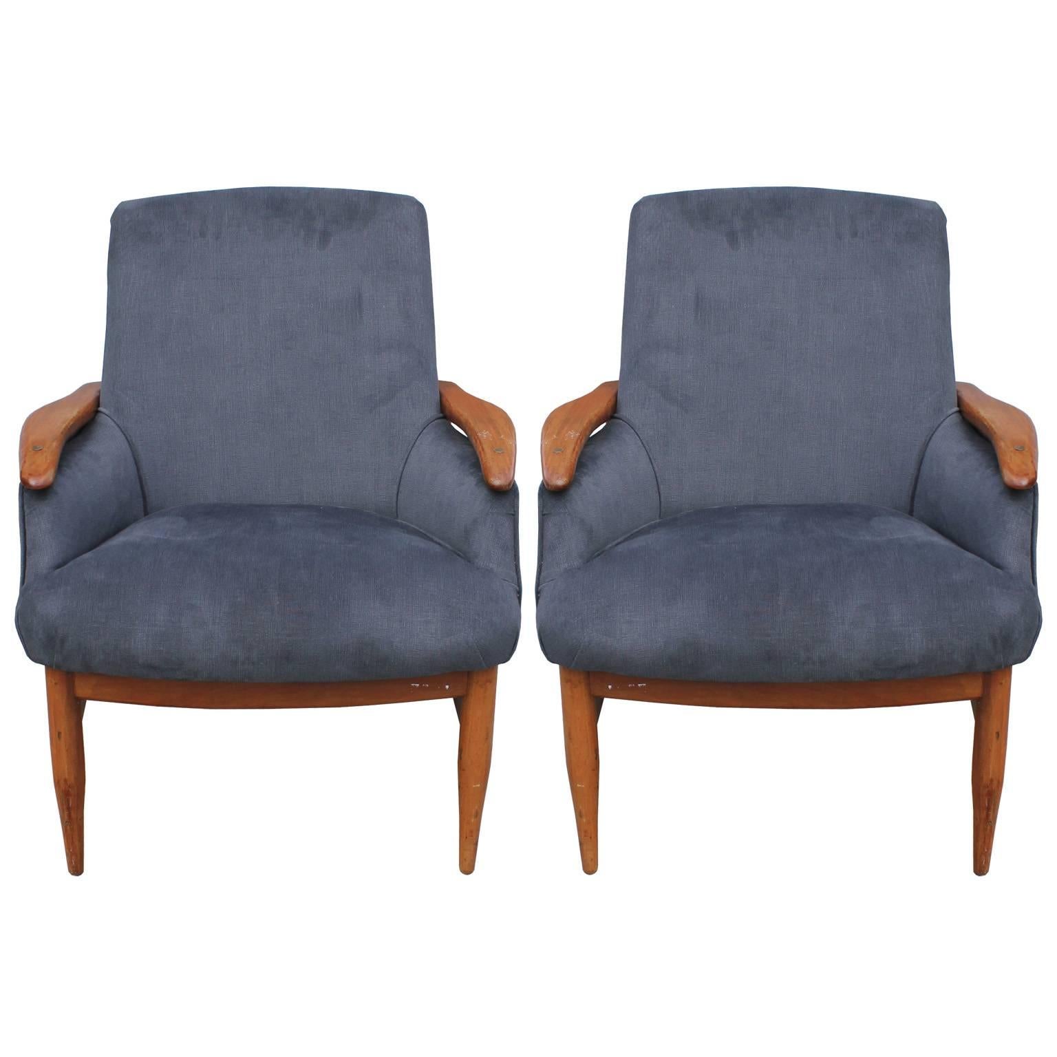 Excellent pair of lounge chairs. Chairs feature sculptural teak bases with lots of negative space. Upholstered in a luxe grey velvet recently. The frames are in nice vintage condition.
   