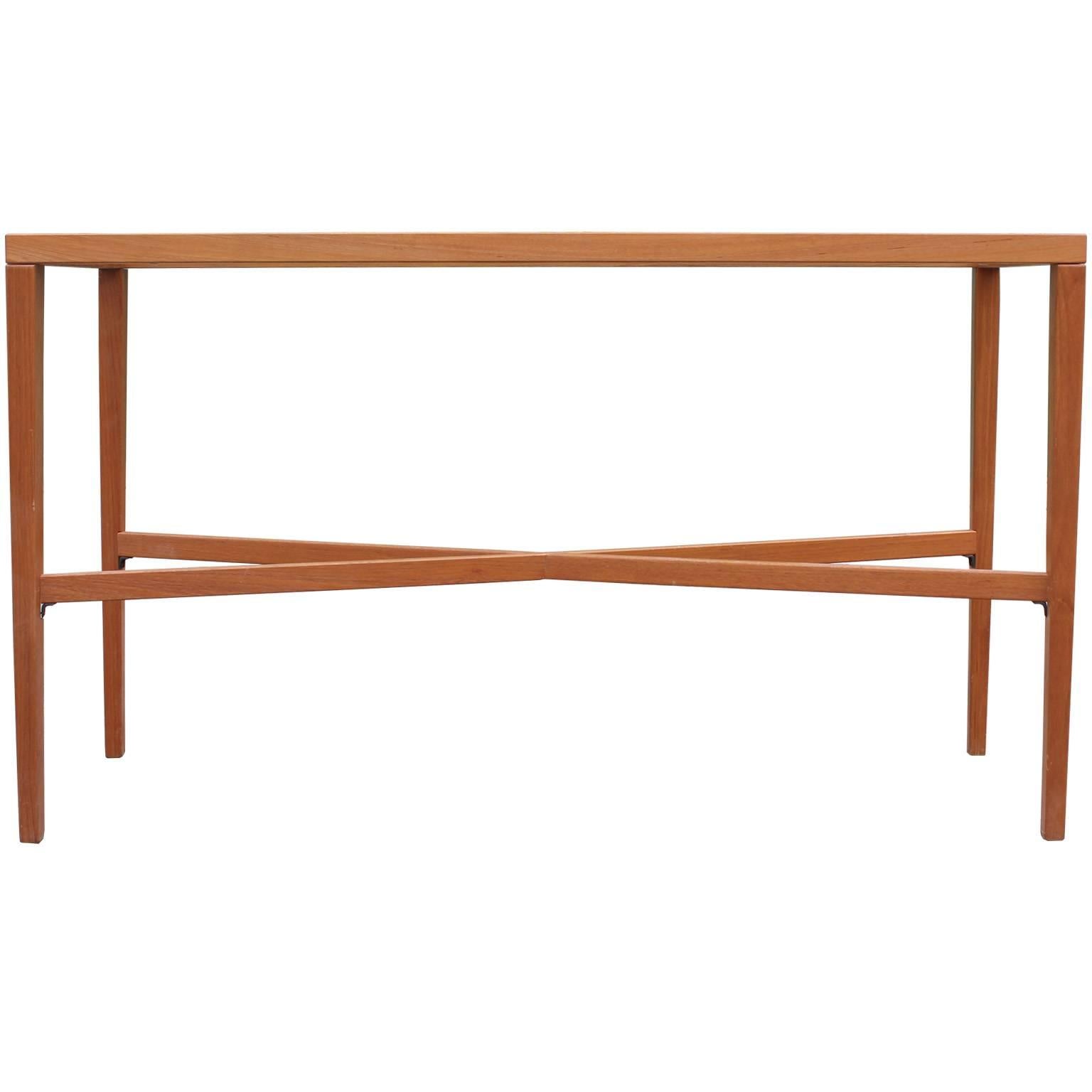 Great delicate Danish teak console with glass top and X stretcher. The table is airy and light perfect against a wall or behind a sofa. In excellent vintage condition.