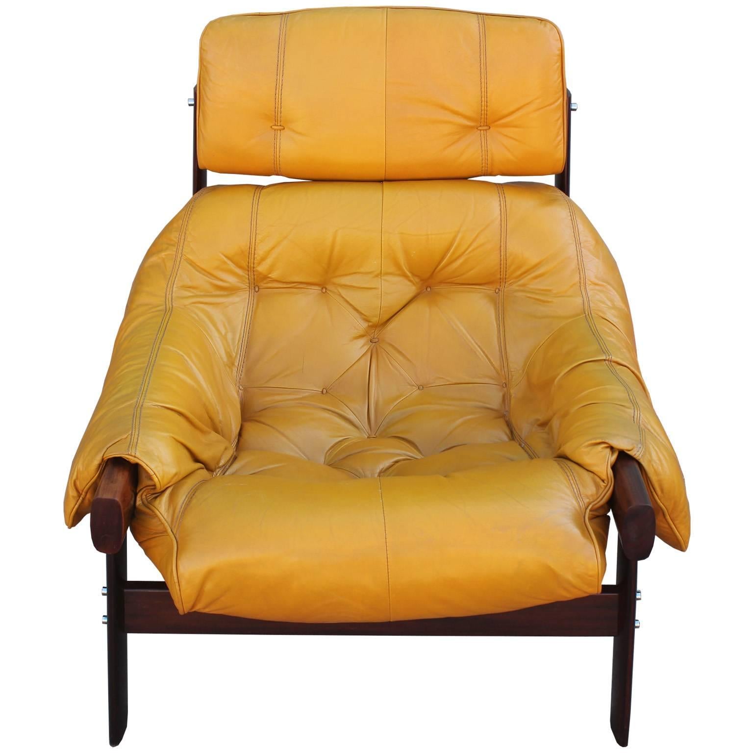 Percival Lafer Brazilian mustard yellow lounge chair with ottoman. The wonderful chair has a supple leather with lots of detail and stitching. Great Design. In excellent vintage condition with a few very minor flaws to the leather that are basically