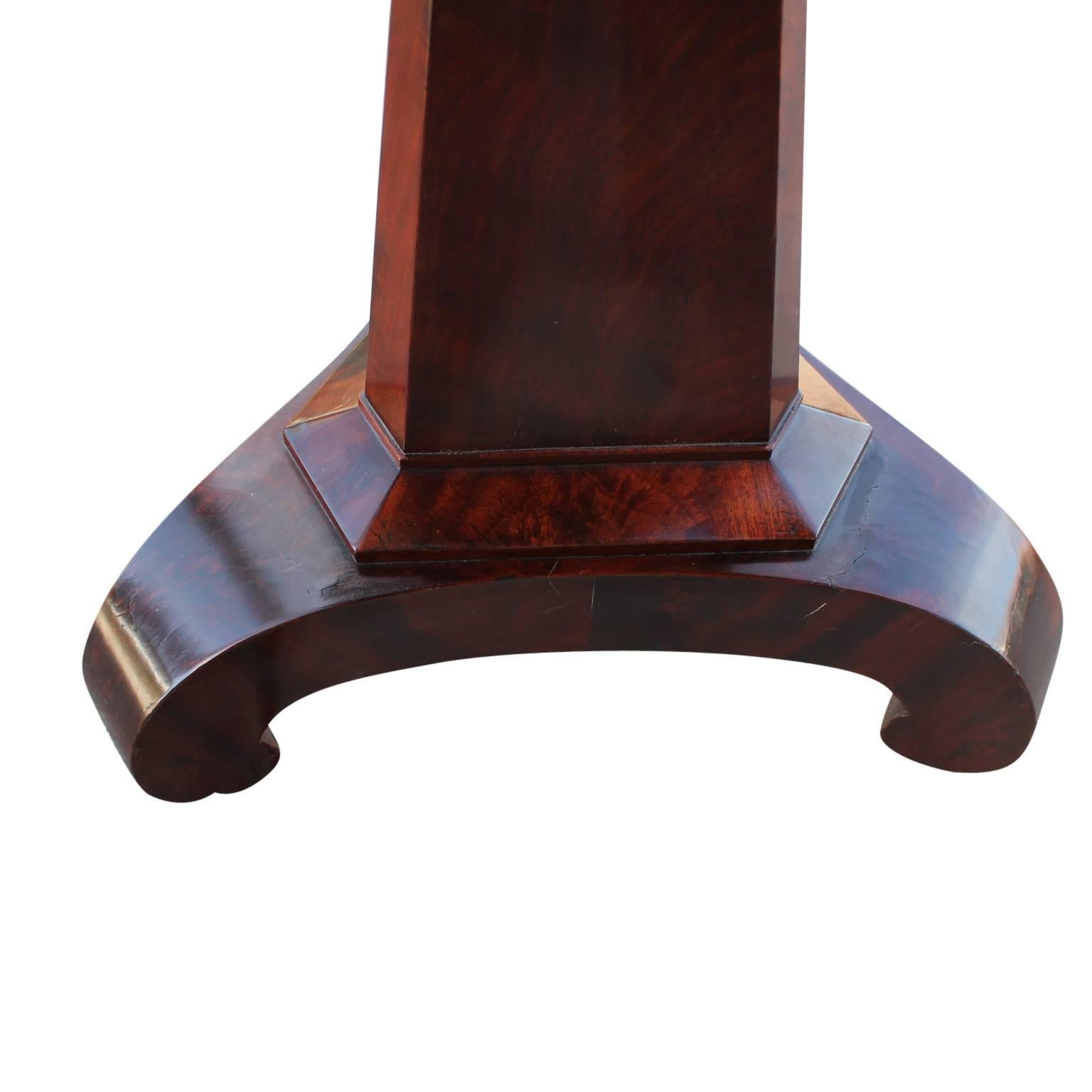 Early Empire mahogany adjustable piano stool.