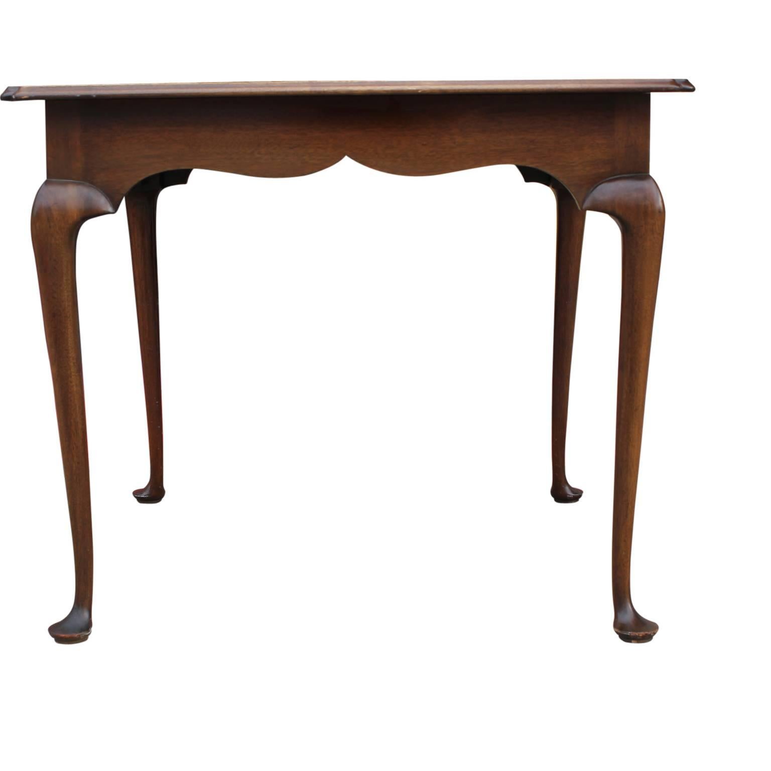 Queen Anne leather topped square game table.