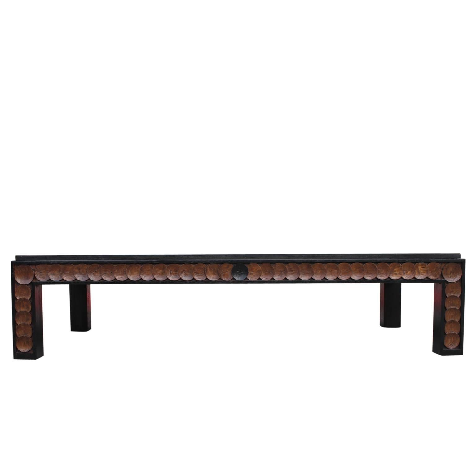 Large unique rectangle walnut Henredon coffee table. The table feature wonderful circle detailing all around the edges. The trim is in an ebony stain. The top has wonderful inlaid parquetry. In great vintage condition. 