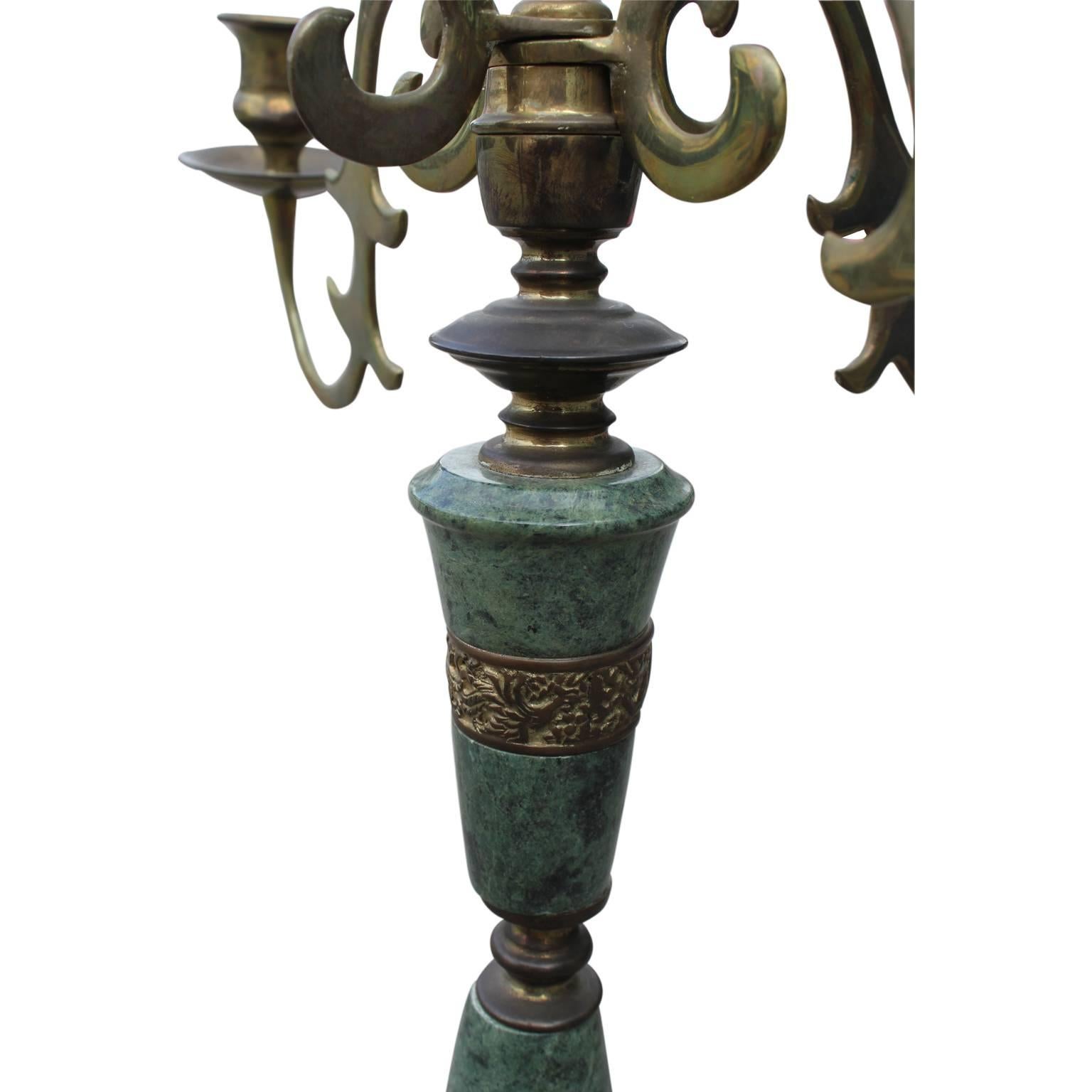 Green marble and brass candelabra with and Asian or Oriental inspiration.