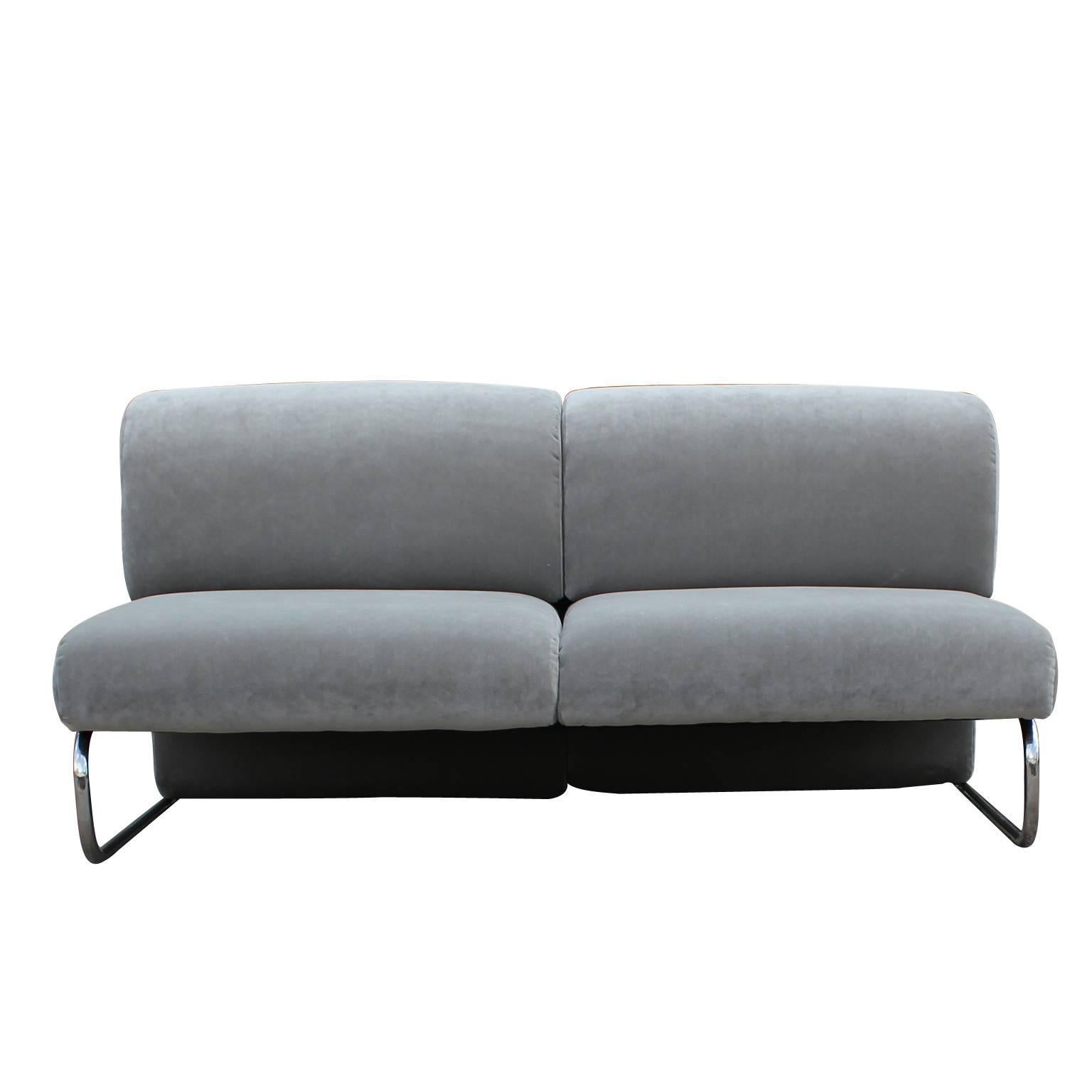1970s Italian modern sofa recently reupholstered in a beautiful soft grey velvet with tubular chrome perfect for your mid-century modern home. 