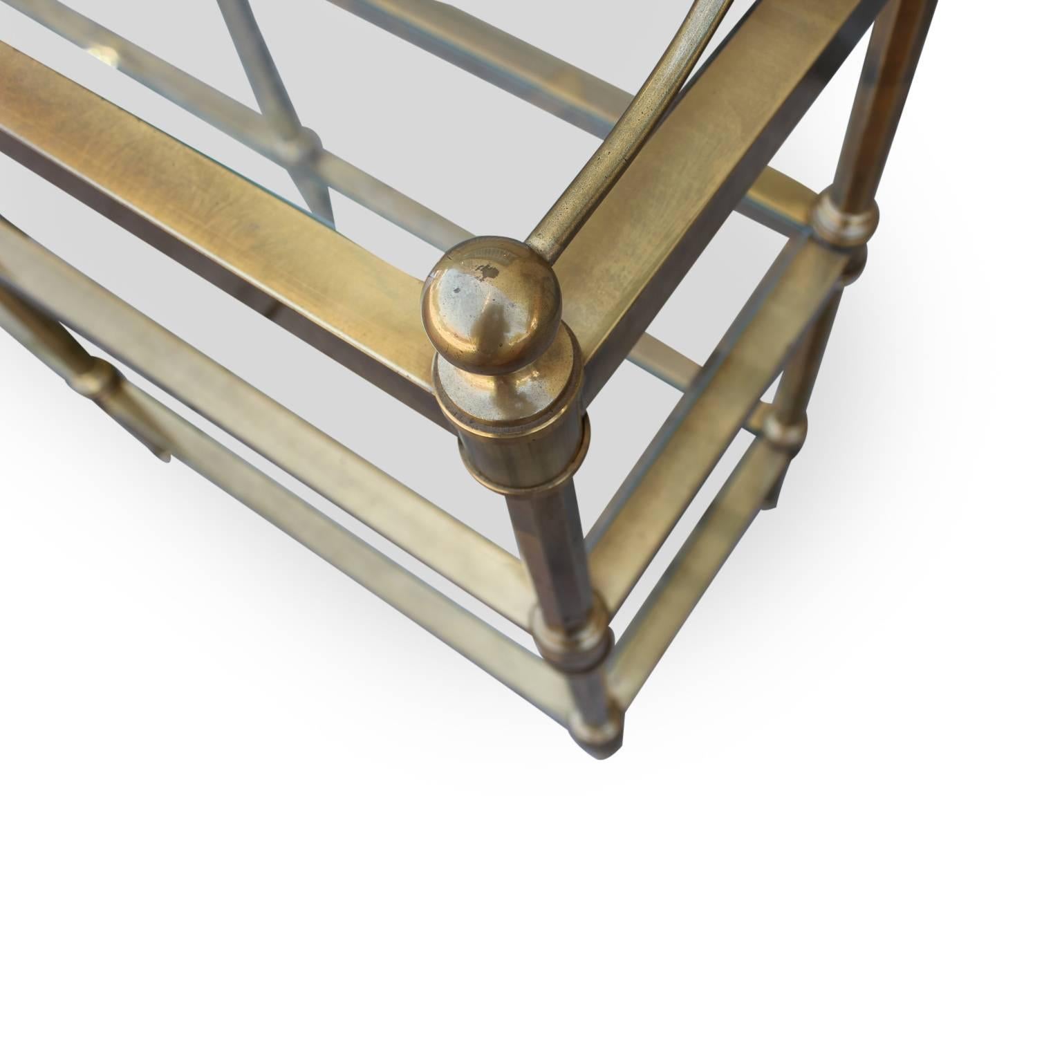Heavy solid brass French shelf or display with glass. The piece is very well made and is very high quality.