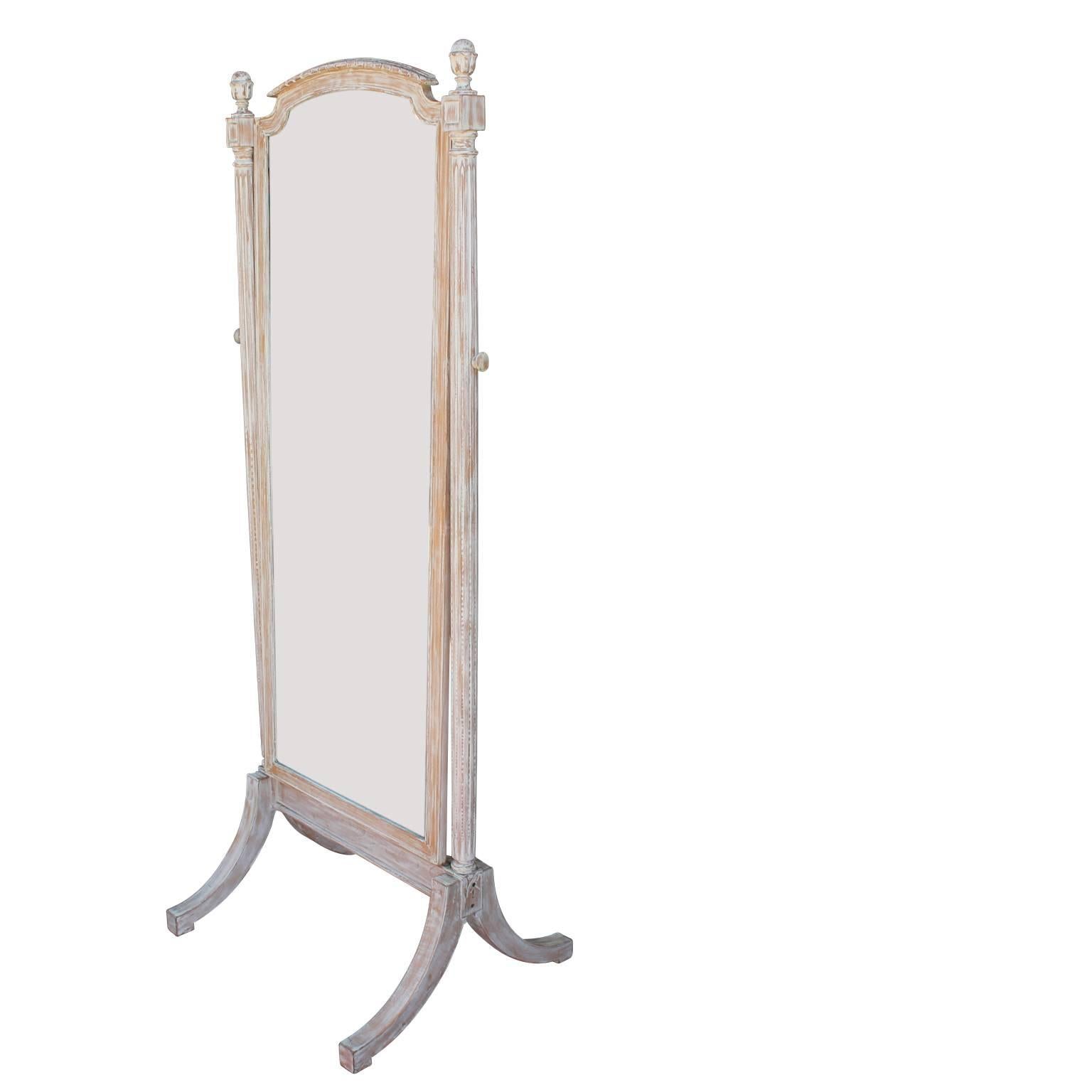 Stunning free-standing floor mirror with a simple yet decadent frame.