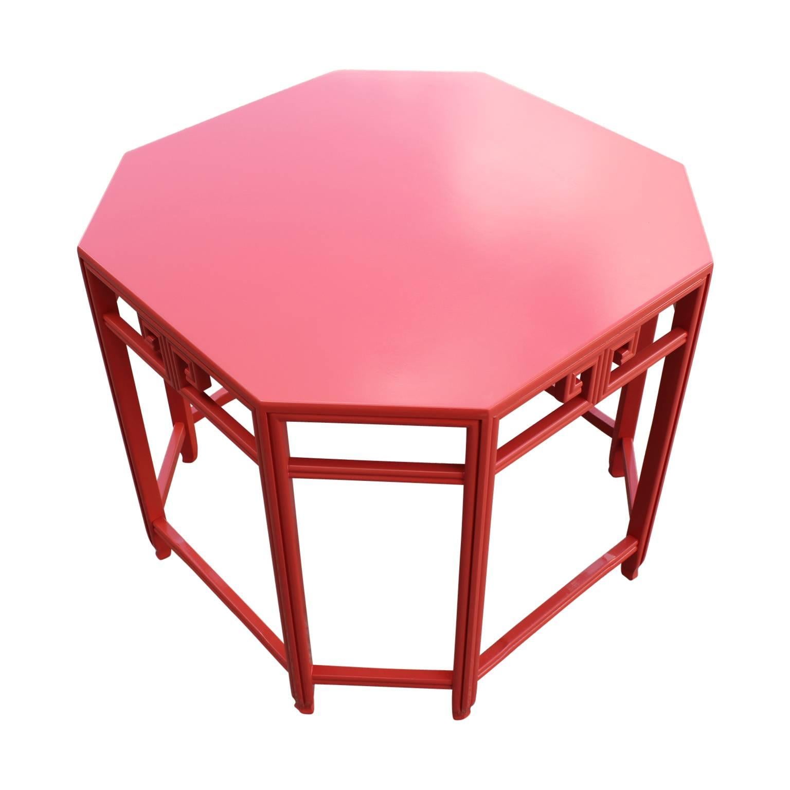 Side / end octagon table by Baker Furniture Company lacquered in an orange and coral color with a hint of Asian inspiration. Glass top available.