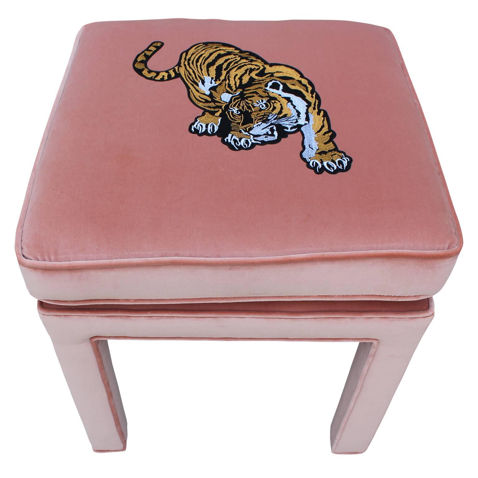 Luxe modern pair of custom-made light pink velvet ottomans or stools with detailed Chinese tiger embroidery. Style from Parsons School of Art and Design or Milo Baughman. We can custom make these for you in any dimensions or fabric. Custom