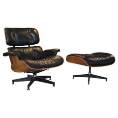 Modern Black Leather and Walnut Herman Miller Eames Lounge Chair and Ottoman