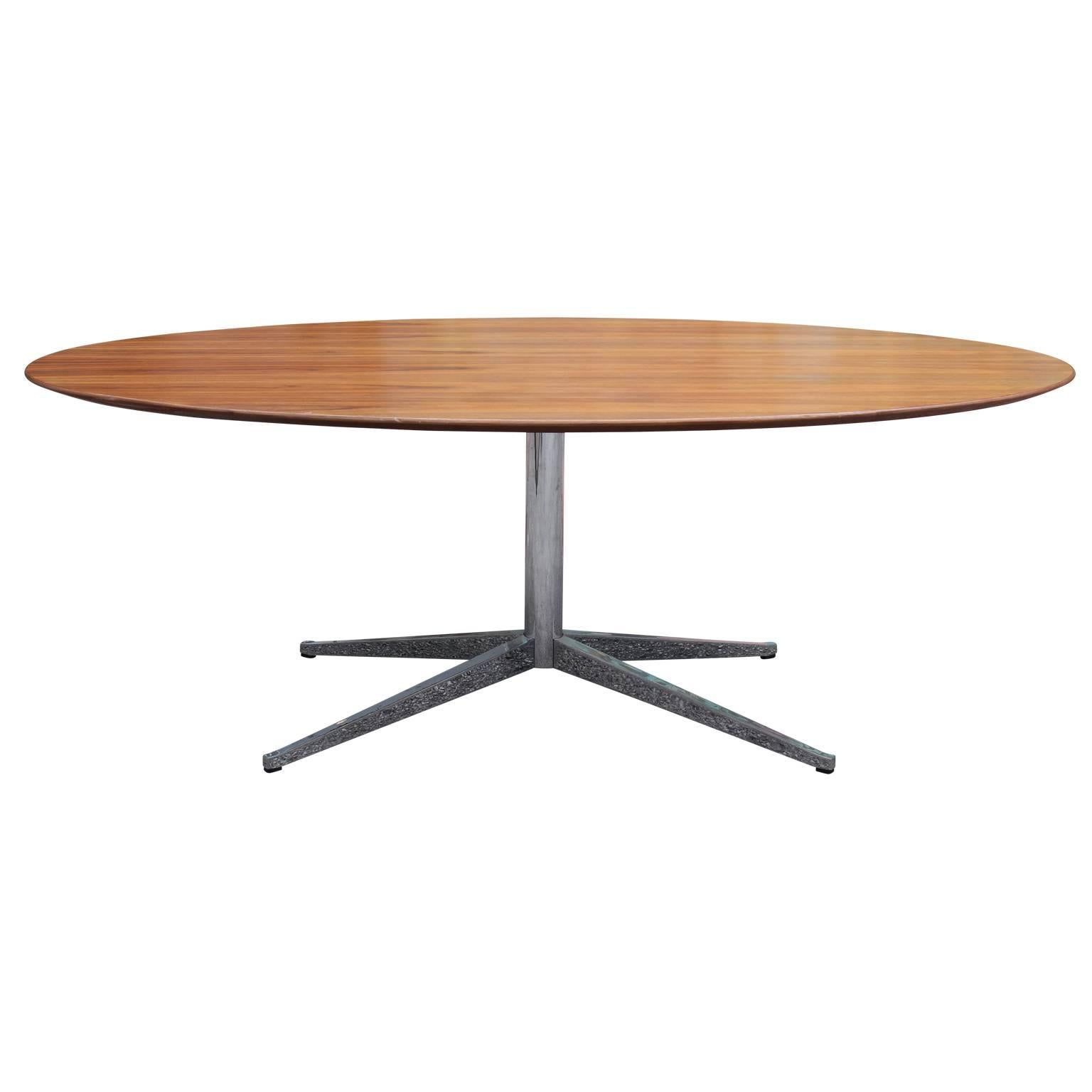 Modern Florence Knoll for Knoll walnut and chrome oval dining table or conference table.