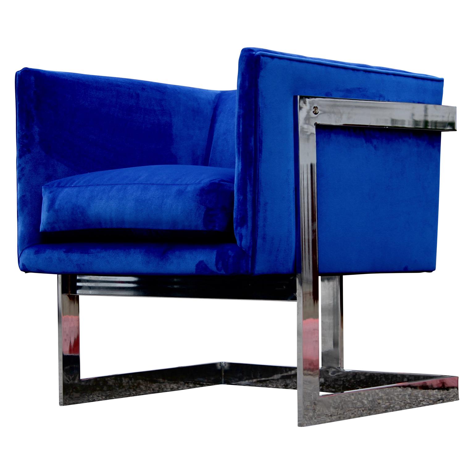 Gorgeous chrome cantilevered cube lounge chair designed by Milo Baughman for Thayer Coggin freshly upholstered in a lush blue velvet. We have three available for purchase.