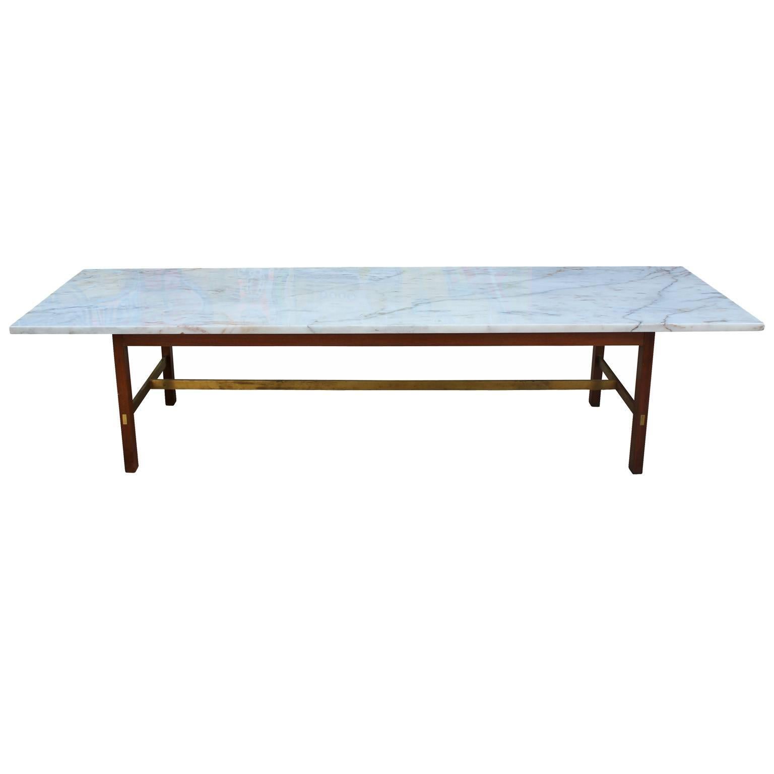 Great Paul McCobb Coffee table with brass bars, walnut legs, and a marble top. The Table was made by Calvin Furniture. The table is in nice vintage condition. The brass has a lovely patina and can be polished if desired.