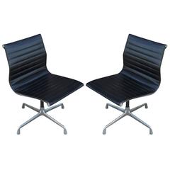 Two Eames Aluminum Group Chairs