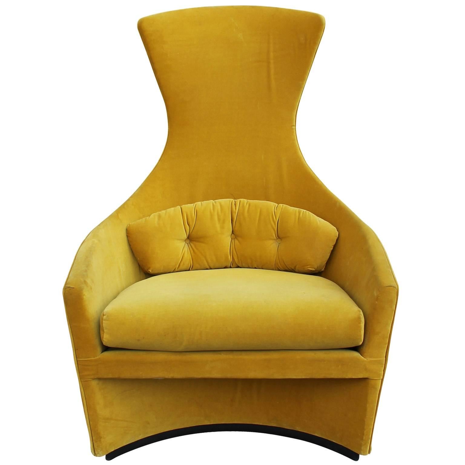 Unusual pair of lounge chairs by Adrian Pearsall for Craft Associates. Chairs are upholstered in original mustard velvet. A half moon shaped base ads interest to the piece while a sculptural back brings the eye up. Upholstery is in vintage condition