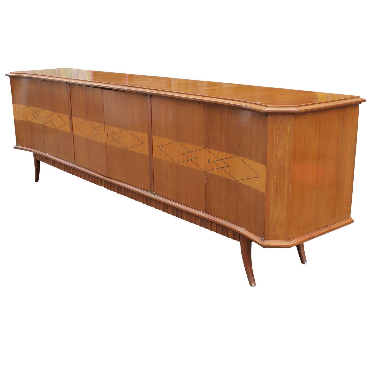 Hollywood Regency Monumental Italian Sideboard with Dentil Motif Base and Saber Legs