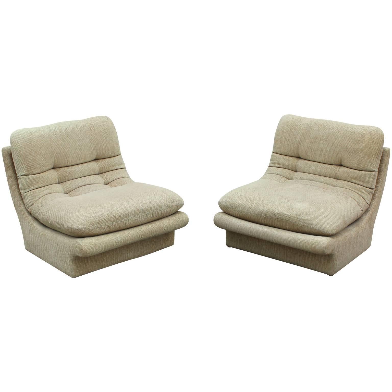 Beautiful pair of Sculptural Vladimir Kagan for Preview slipper lounge chairs with matching ottoman. Scooped chairs are extremely comfortable. Cushions have beep box tufts. Chairs can be pushed together to form a love seat. The fabric is vintage and