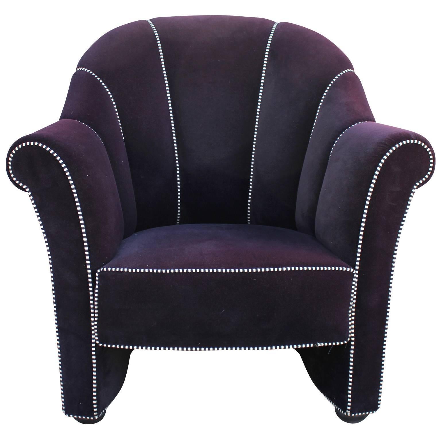 Pair of lounge chair designed by Josef Hoffmann and made by Wittmann of Austria. Originally designed for the Koller House in 1911. Eggplant purple velvet with black and white welting. Some minor damage to the welting on one chair. 