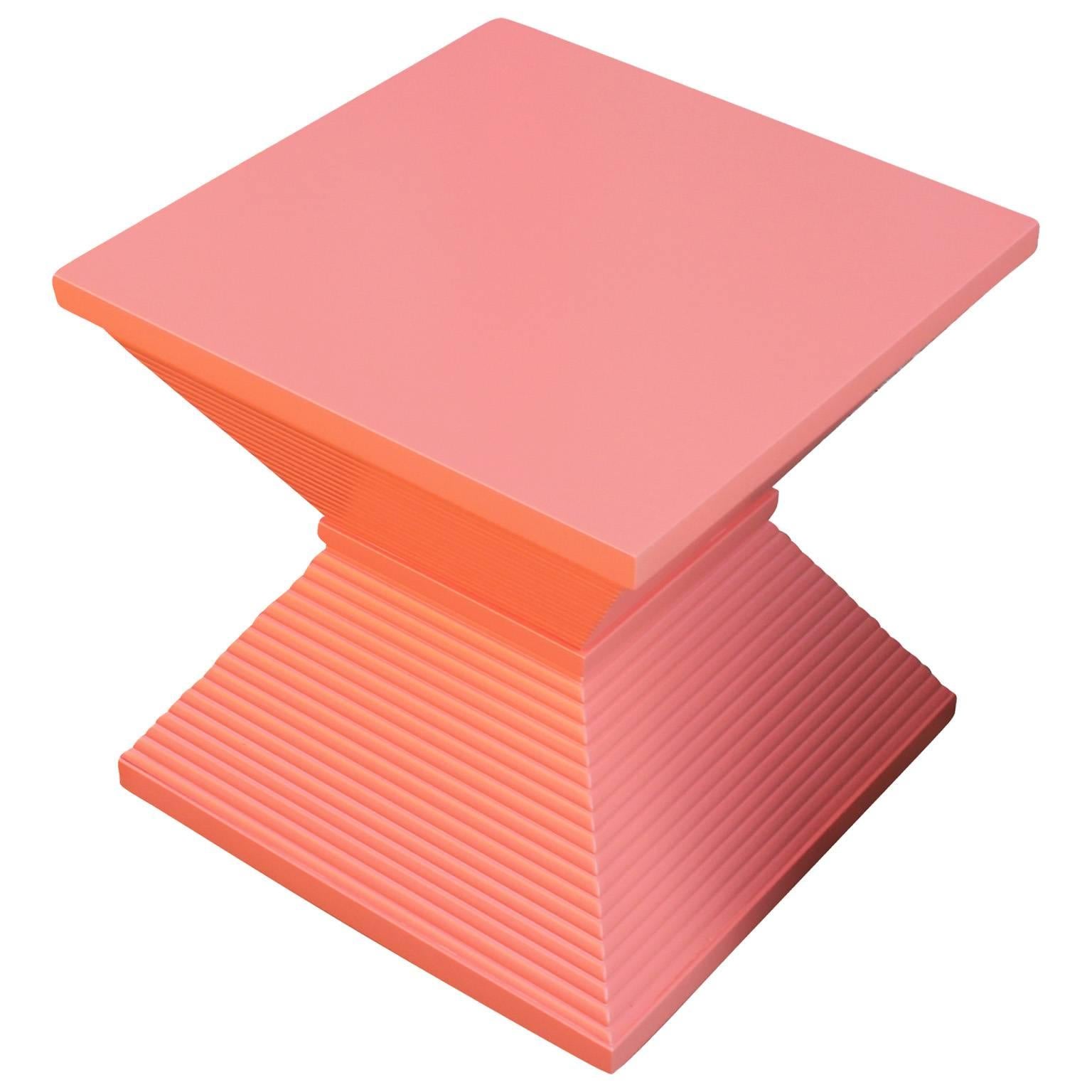 Wonderful pair of side tables. Double pyramid shaped tables are freshly lacquered in coral. Perfect pop of color for any space!