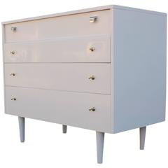 Modern Sleek Neutral Lacquered Four Drawer Chest with Brass Handles
