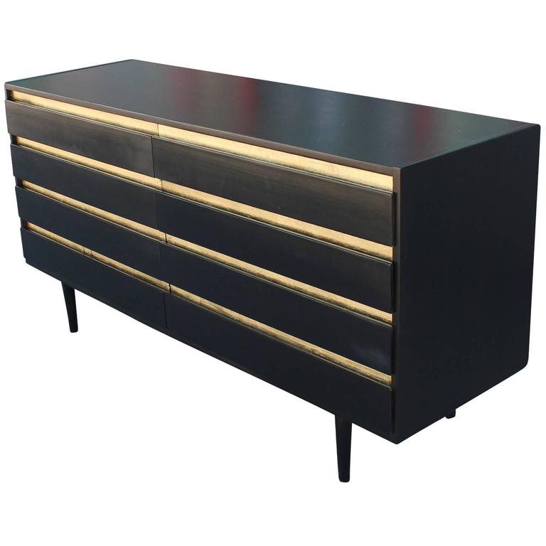 gold and black dresser