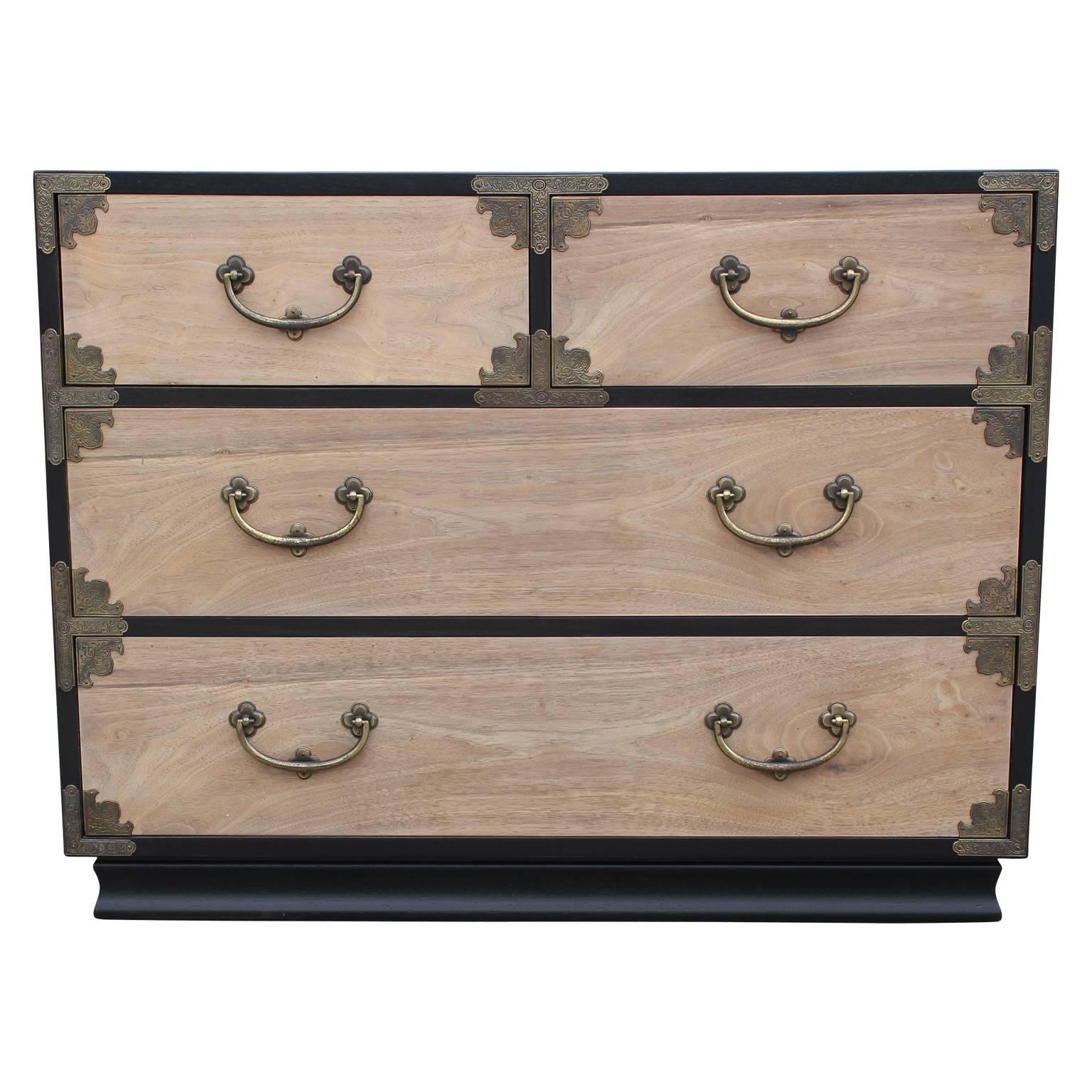 Luxe pair of two tone Henredon nightstands or bachelor's chests. Chests are made out of walnut that has recently been bleached. Intricate brass tone hardware has an excellent patina. The chests / cabinet are in very nice vintage condition with light
