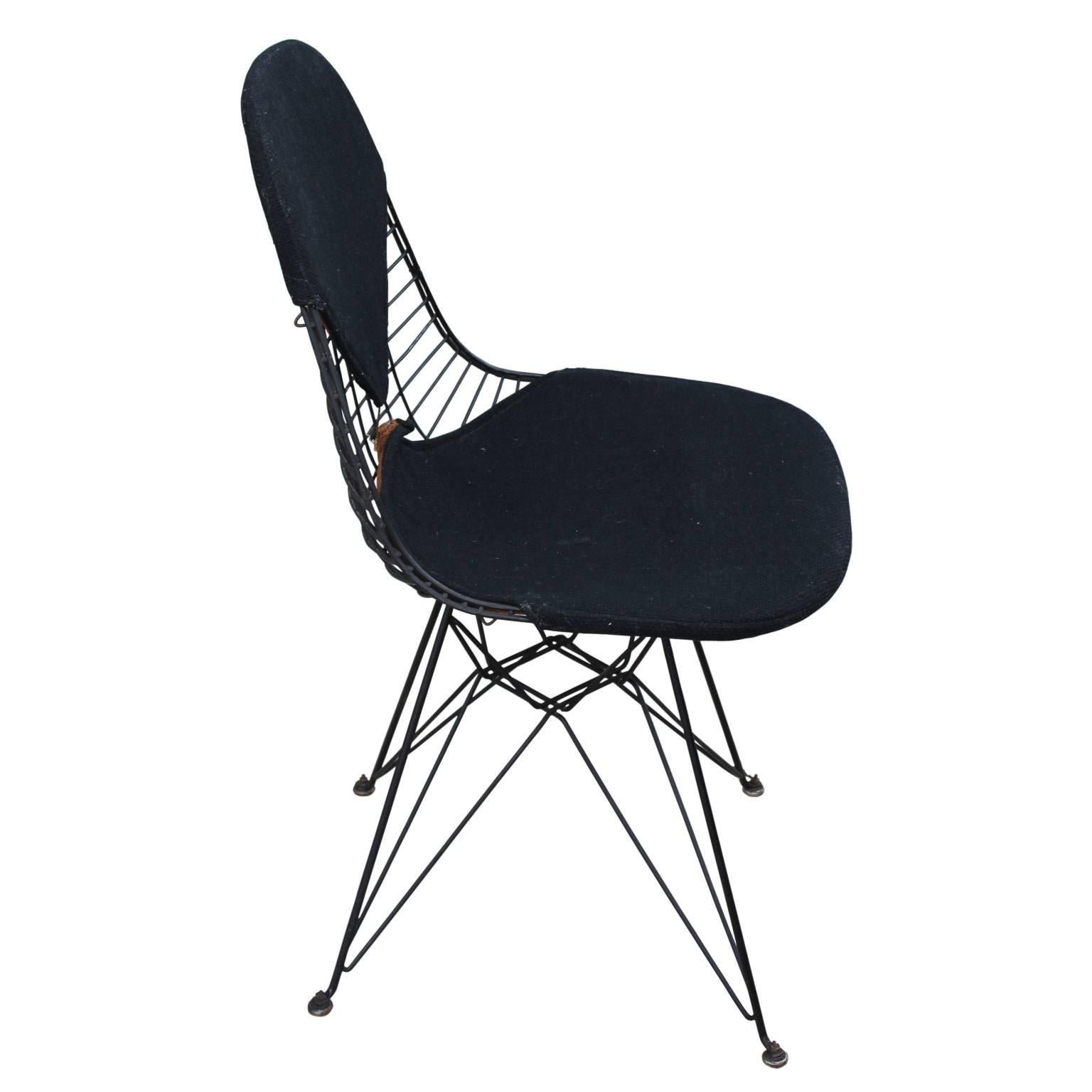 Early Eames - Herman Miler black bikini wire chair with the original upholstery. 
In excellent vintage conidtion. 