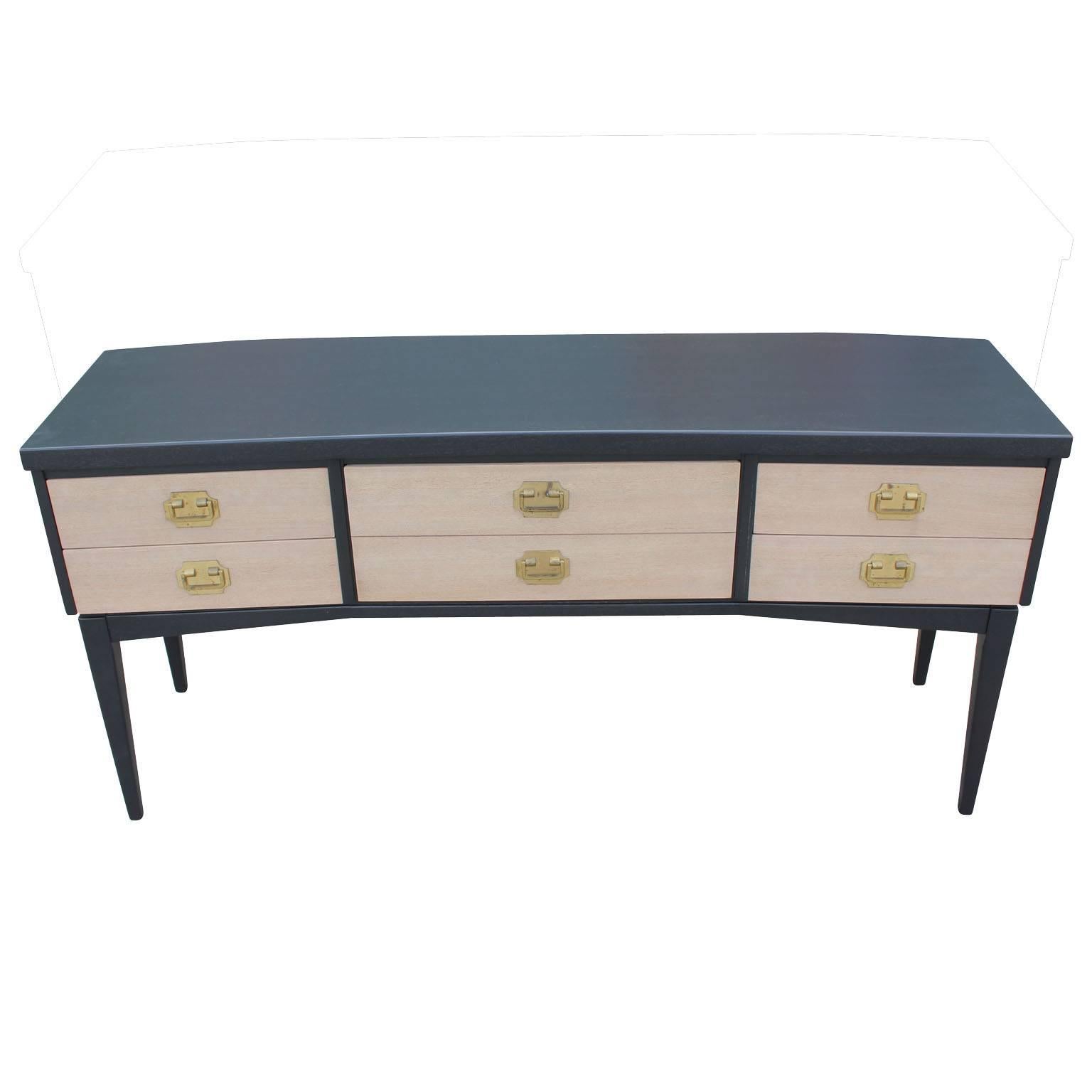 Beautiful two-toned sideboard / dresser/ Console with recently bleached and ebonized wood and outfitted with gorgeous brass hardware. This piece features five drawers; two small on the left and right, and a large drawer in the center. Would also