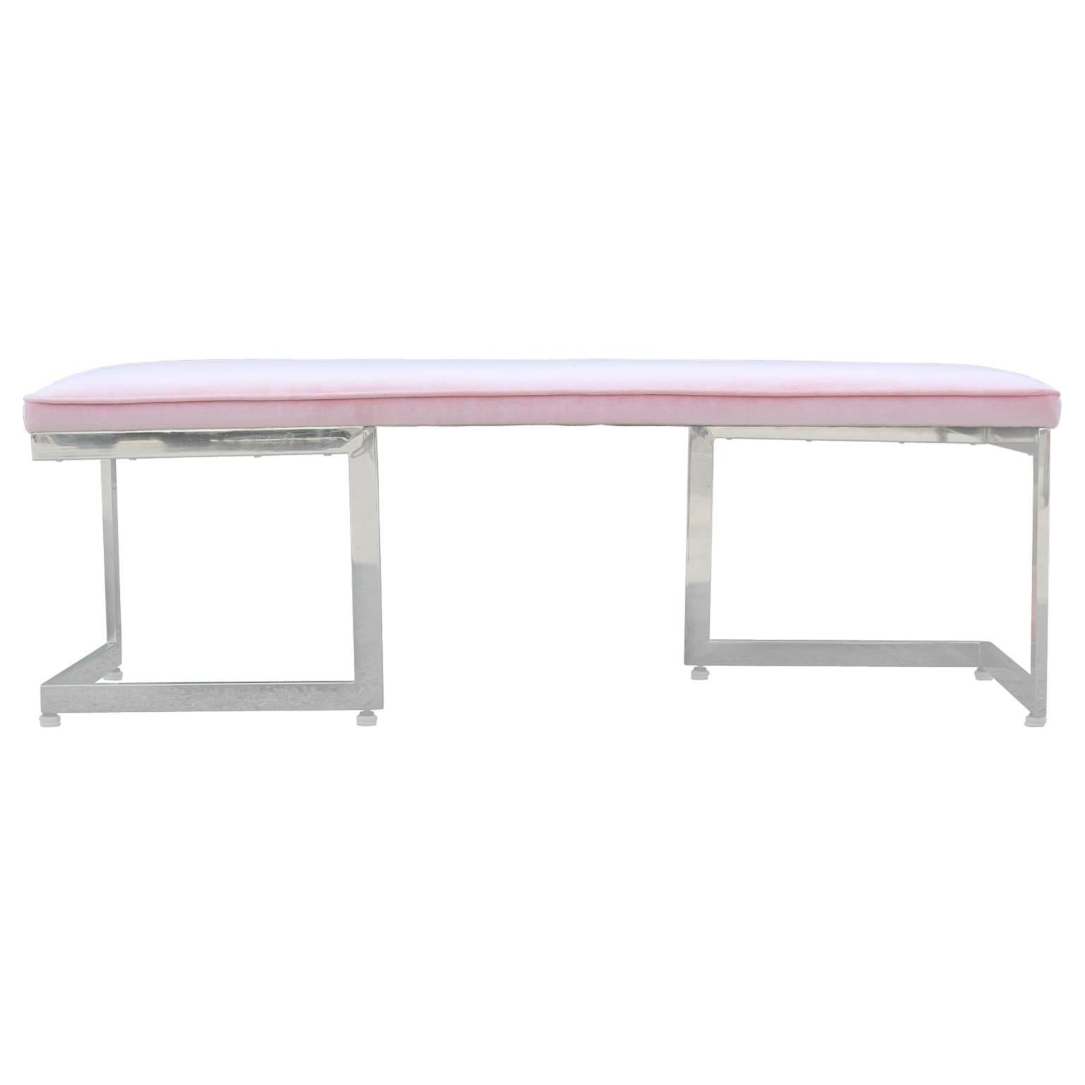 Gorgeous Milo Baughman style asymmetrical chrome bench reupholstered in a light pink velvet. Perfect piece to brighten up the room as the chrome reflects light.