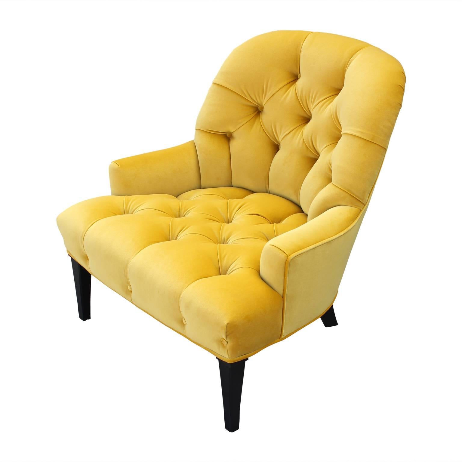 yellow tufted chair