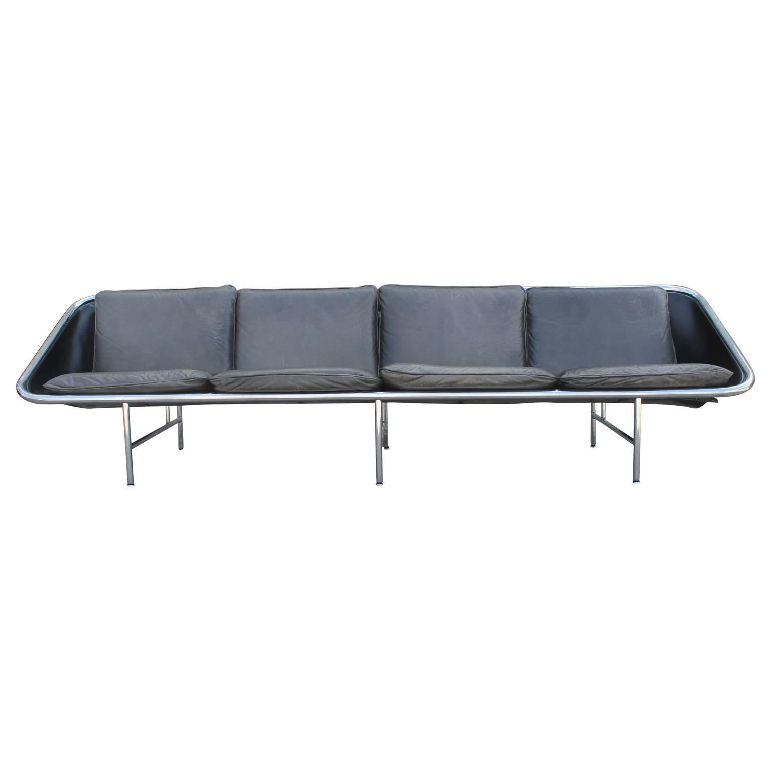 Unique George Nelson for Herman Miller four-seat sofa made of chrome and custom-made cushions in water buffalo leather. There are optional triangular arm pillows available, as seen in the last photo. Extremely sleek and a perfect addition to any