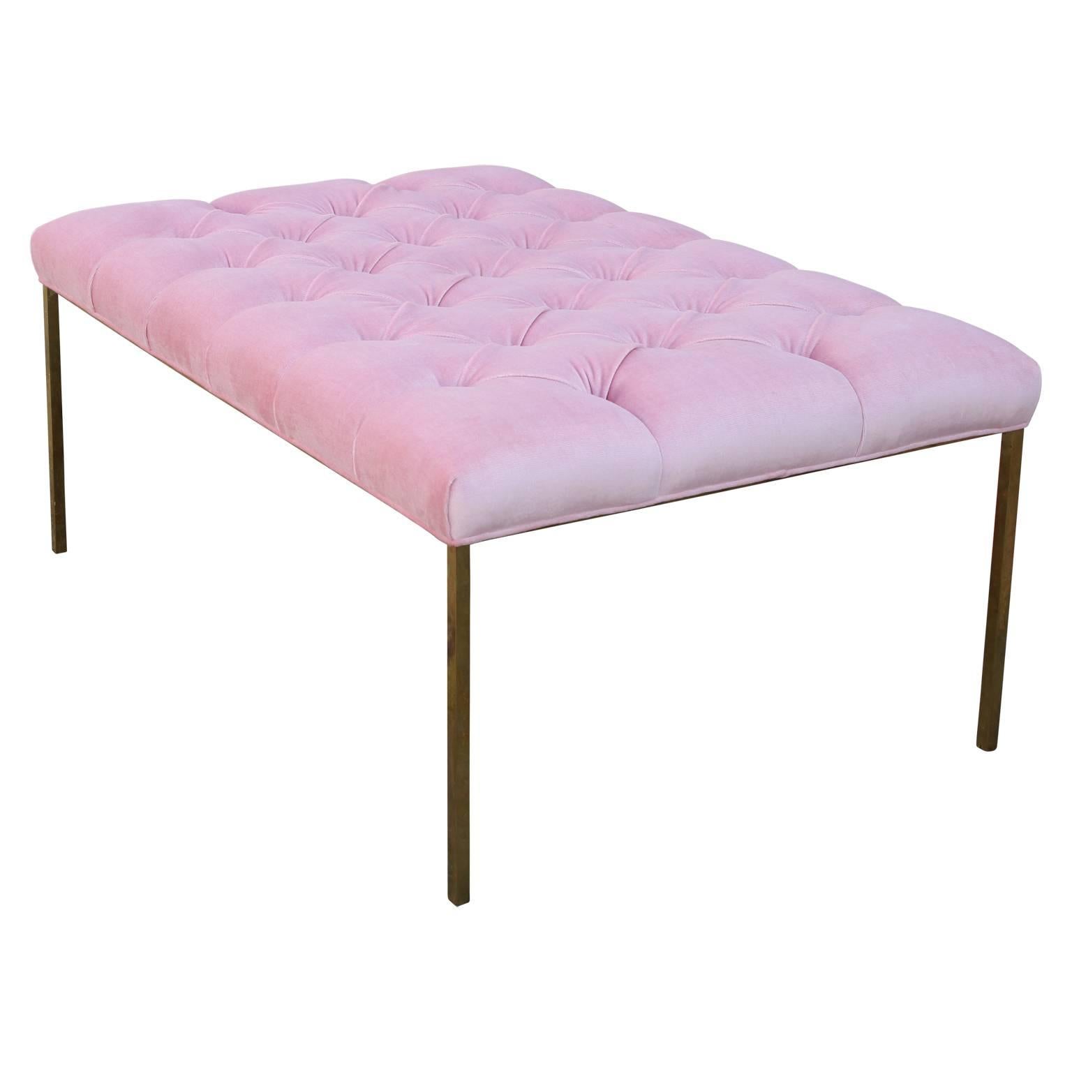 Rectangular bench or ottoman with a brass frame and in a lush light pink tufted Kravet velvet. The brass has a nice natural patina.