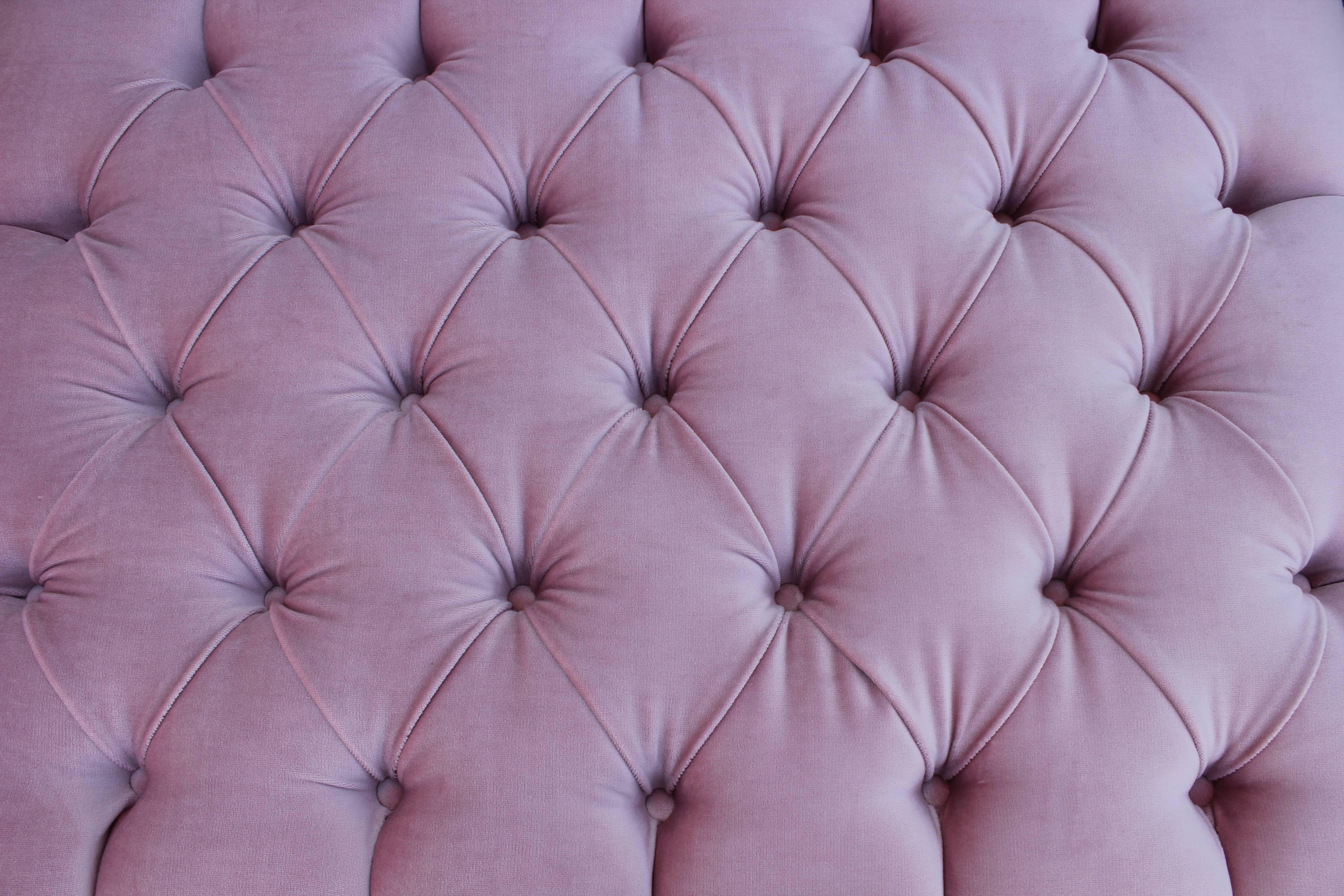 pink tufted bench