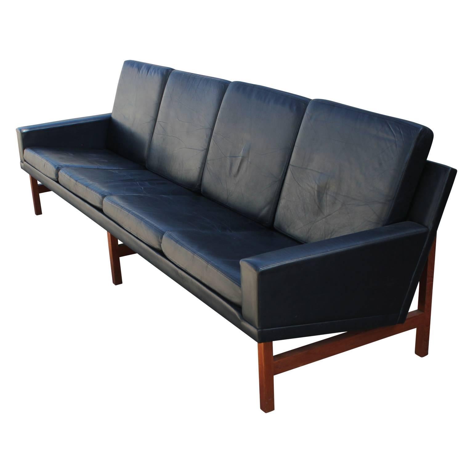 Gorgeous modernist black leather sofa in the style of Hans J. Wegner. Absolutely stunning.