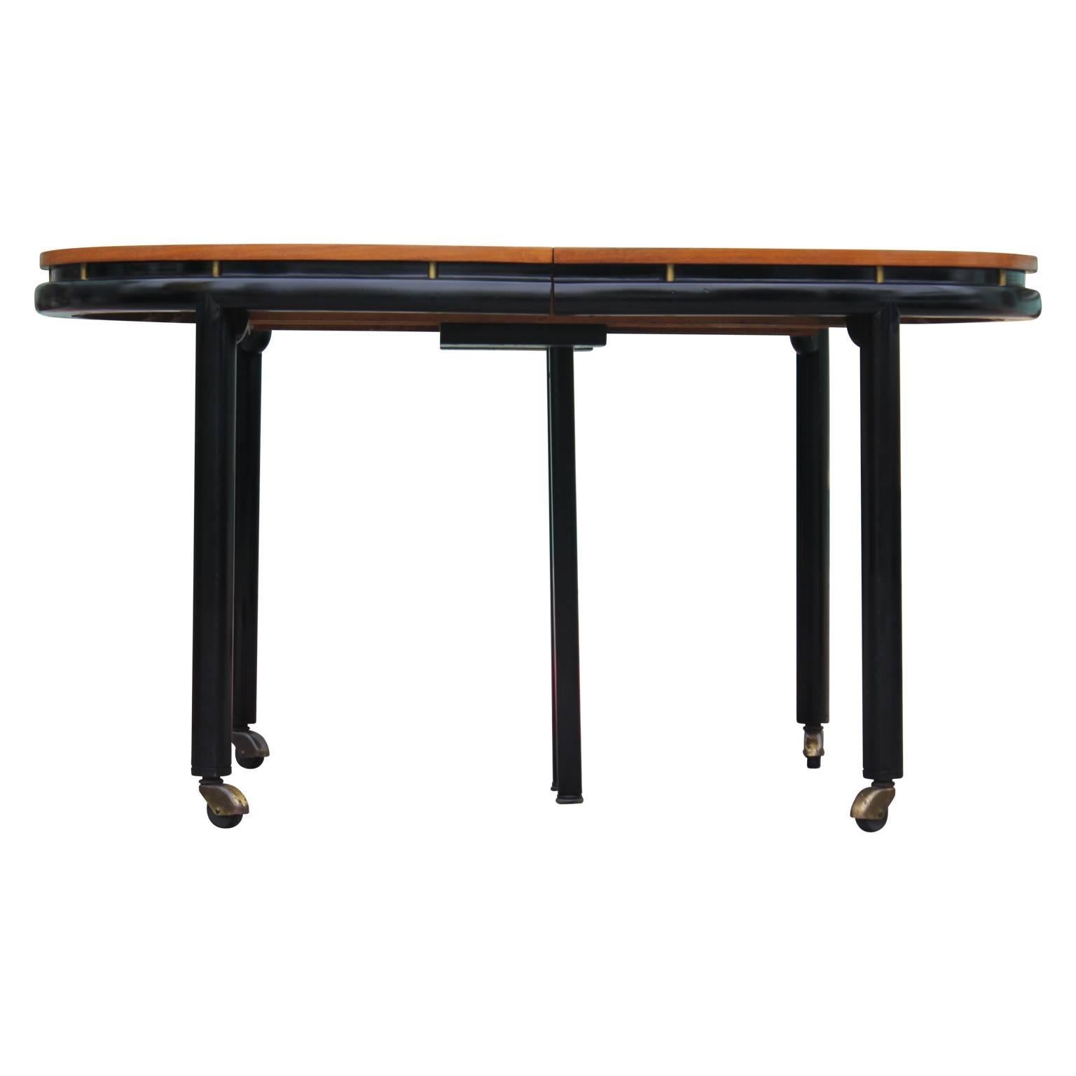 Mid-20th Century Modern Michael Taylor for Baker Walnut Three-Leaf Two-Tone Oval Dining Table
