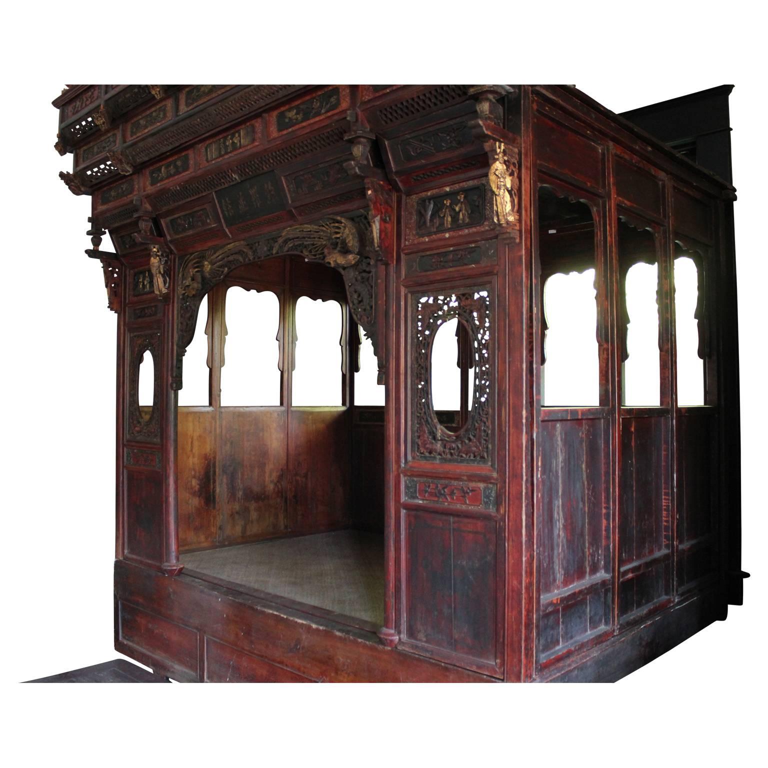 Gorgeous and monumental traditional Chinese wedding bed with platform. The wedding bed is constructed by a set of grooves, so no screws and nails are required. Displays expert traditional Chinese hand-carvings. 

Depth measurement of the bed