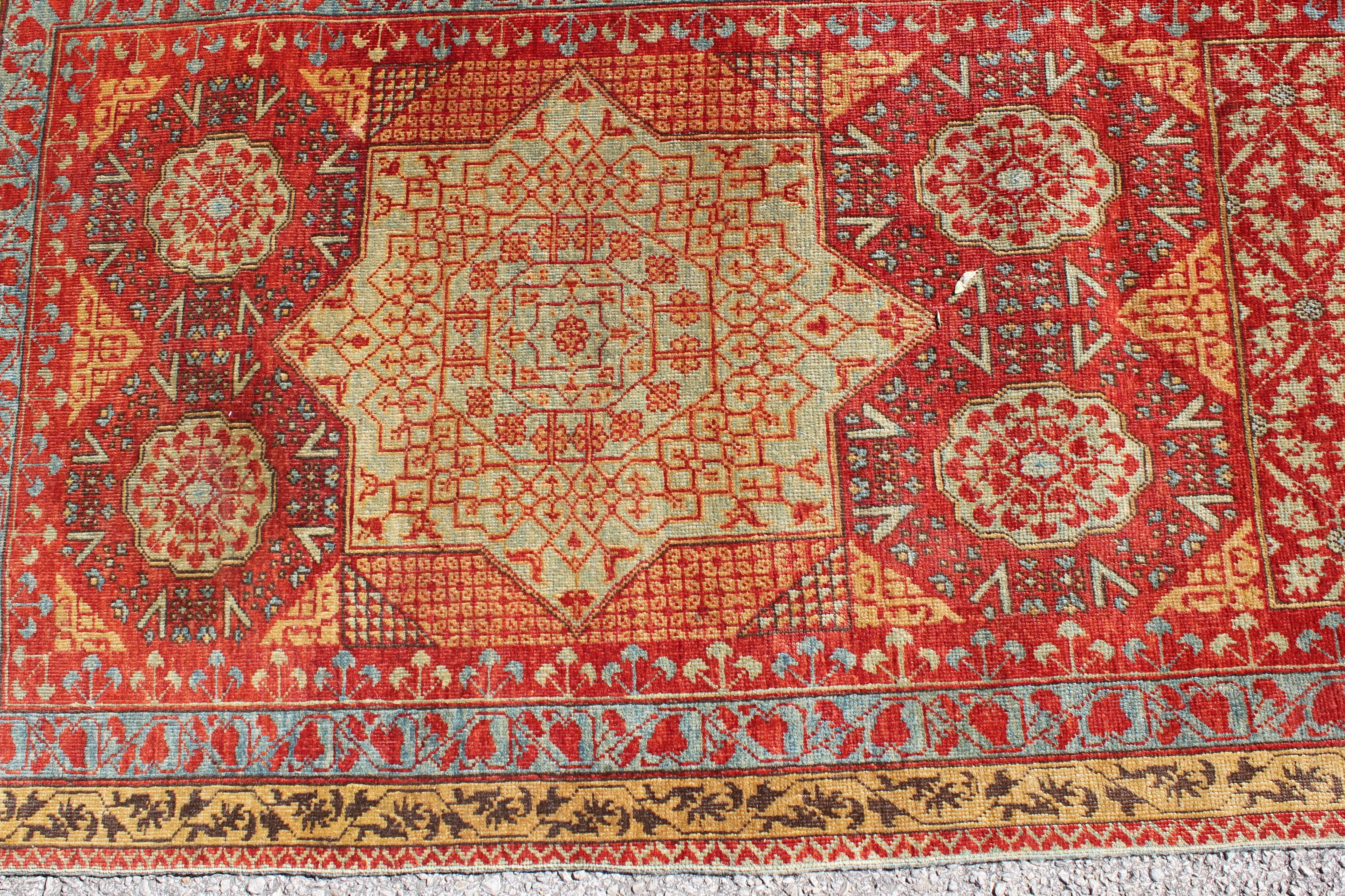 Beautiful Caucasian / Kazak geometric runner rug with eight-sided polygon designs.