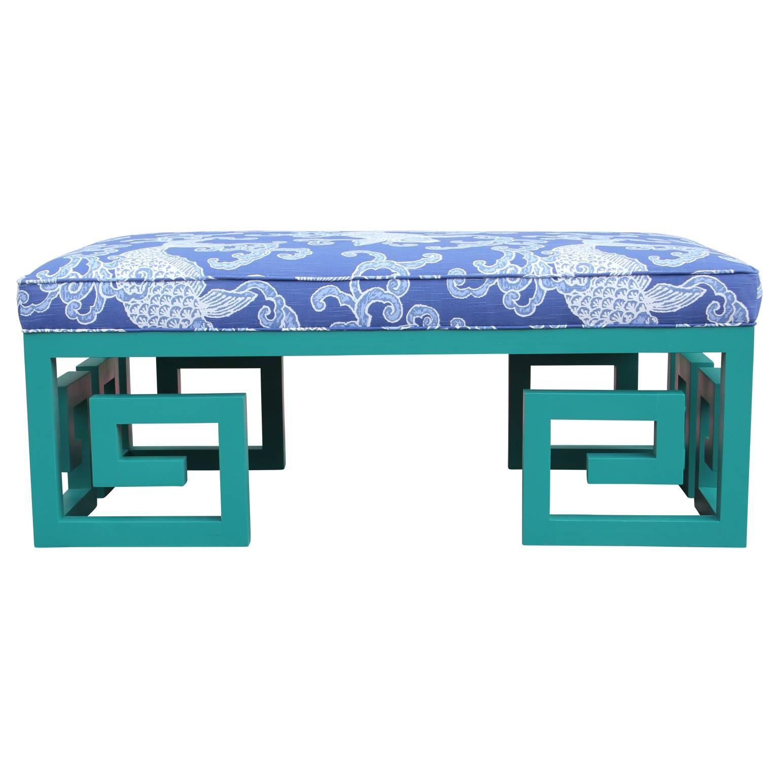 Custom made teal blue Greek key bench with Kravet blue koi fish fabric. This is a custom piece that we make in house. Reminiscent of Kittinger or Baker Furniture 1950s style.