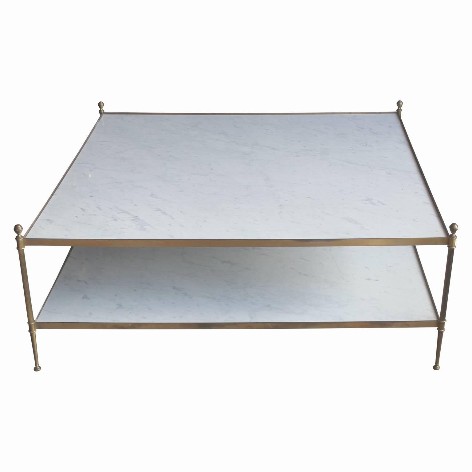 Hollywood Regency marble and brass two-tiered square coffee table. So gorgeous! The brass has a nice patina and the marble is beautiful. Perfect for any modern, mid-mod or hollywood regency home. 