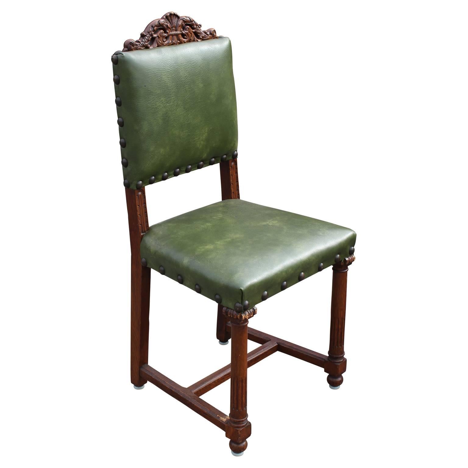 Pair of unique green French renaissance carved oak side / occasional chairs that are a perfect addition to any space. 