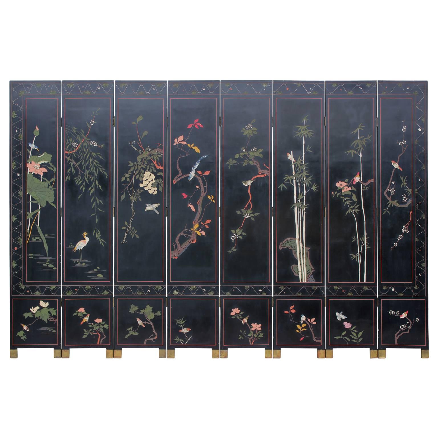 Gorgeous and monumental Chinese coromandel lacquer screen with hand carved Hanzi characters that have also been beautifully painted. Both sides are different from the each other - one displaying birds resting on branches and the other, traditional
