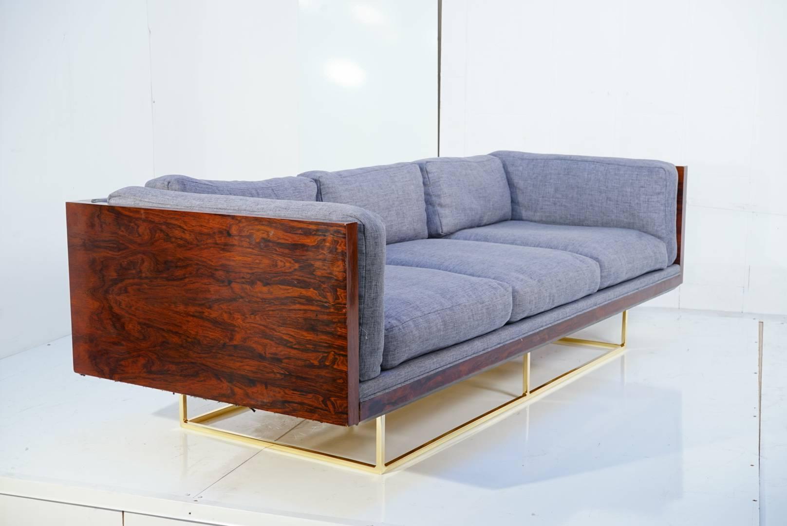Milo Baughman floating tuxedo sofa on brass frame with stunning rosewood.