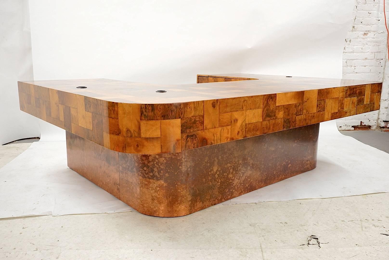 Rare Paul Evans Studio, Cityscape Executive Desk for Directional, Custom Order with Anodized Copper outside base and Bronze Plated Steel Interior Base. Combination of Black Walnut Burl and Olive Burl Wood Veneer Patchwork.  USA Circa 1970